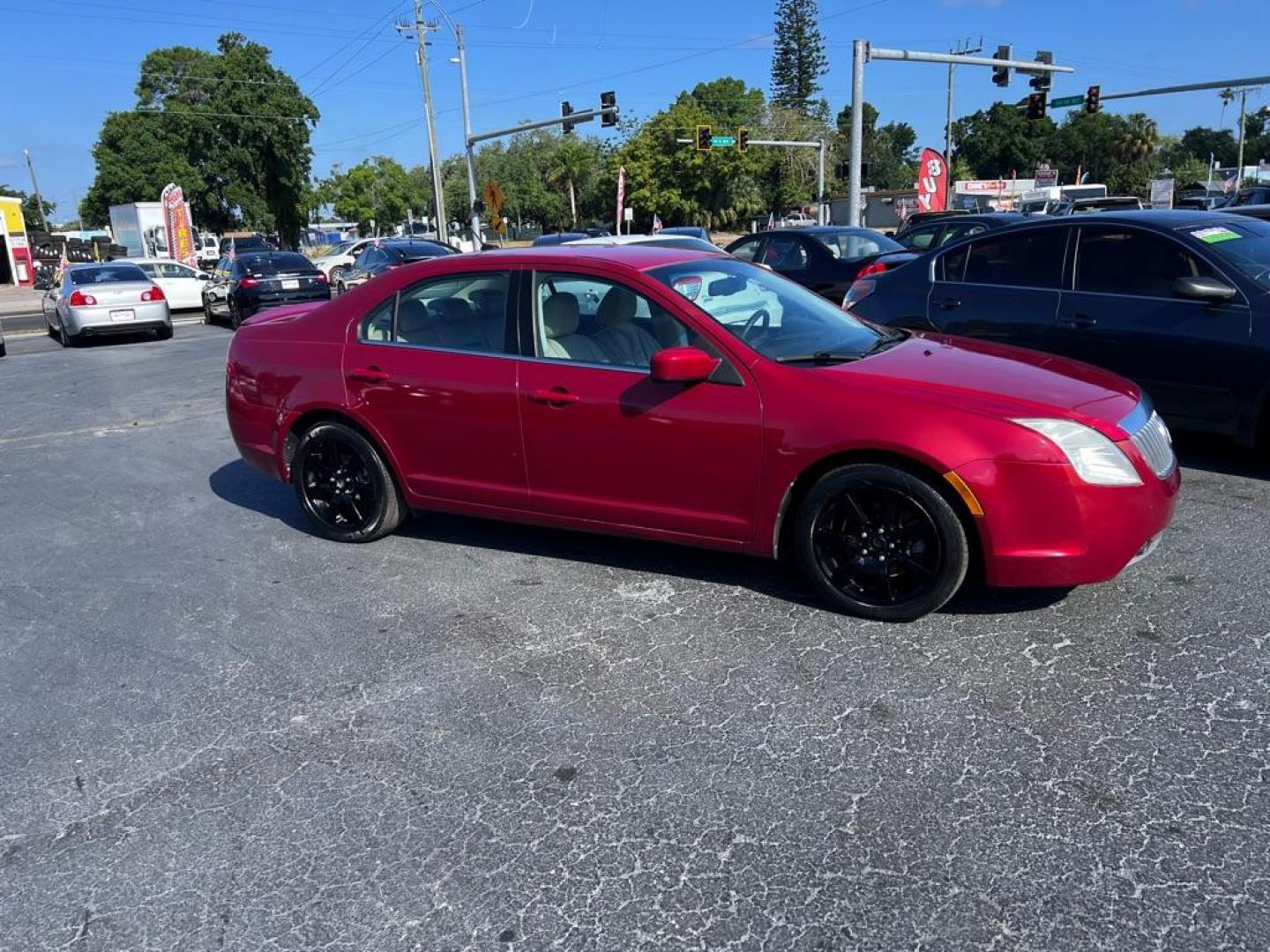 2010 RED MERCURY MILAN PREMIER (3MEHM0JA4AR) with an 2.5L engine, Automatic transmission, located at 2929 9th St. West, Bradenton, 34205, (941) 242-2810, 27.473591, -82.570679 - Photo#0