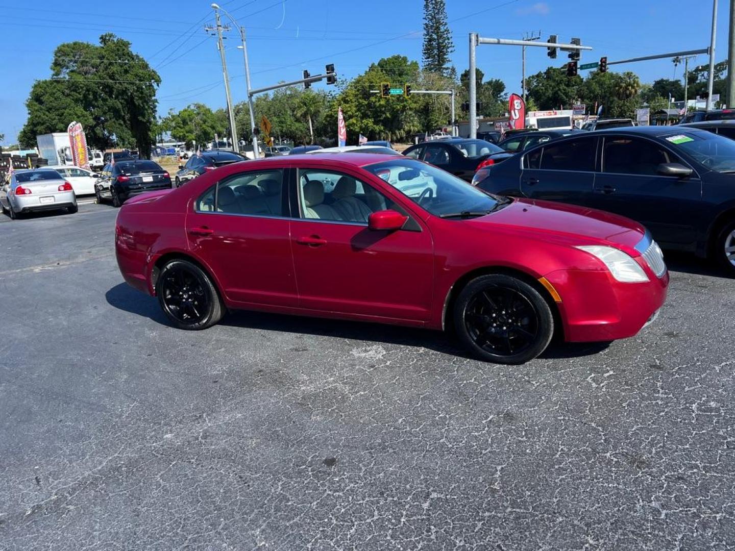 2010 RED MERCURY MILAN PREMIER (3MEHM0JA4AR) with an 2.5L engine, Automatic transmission, located at 2929 9th St. West, Bradenton, 34205, (941) 242-2810, 27.473591, -82.570679 - Photo#1