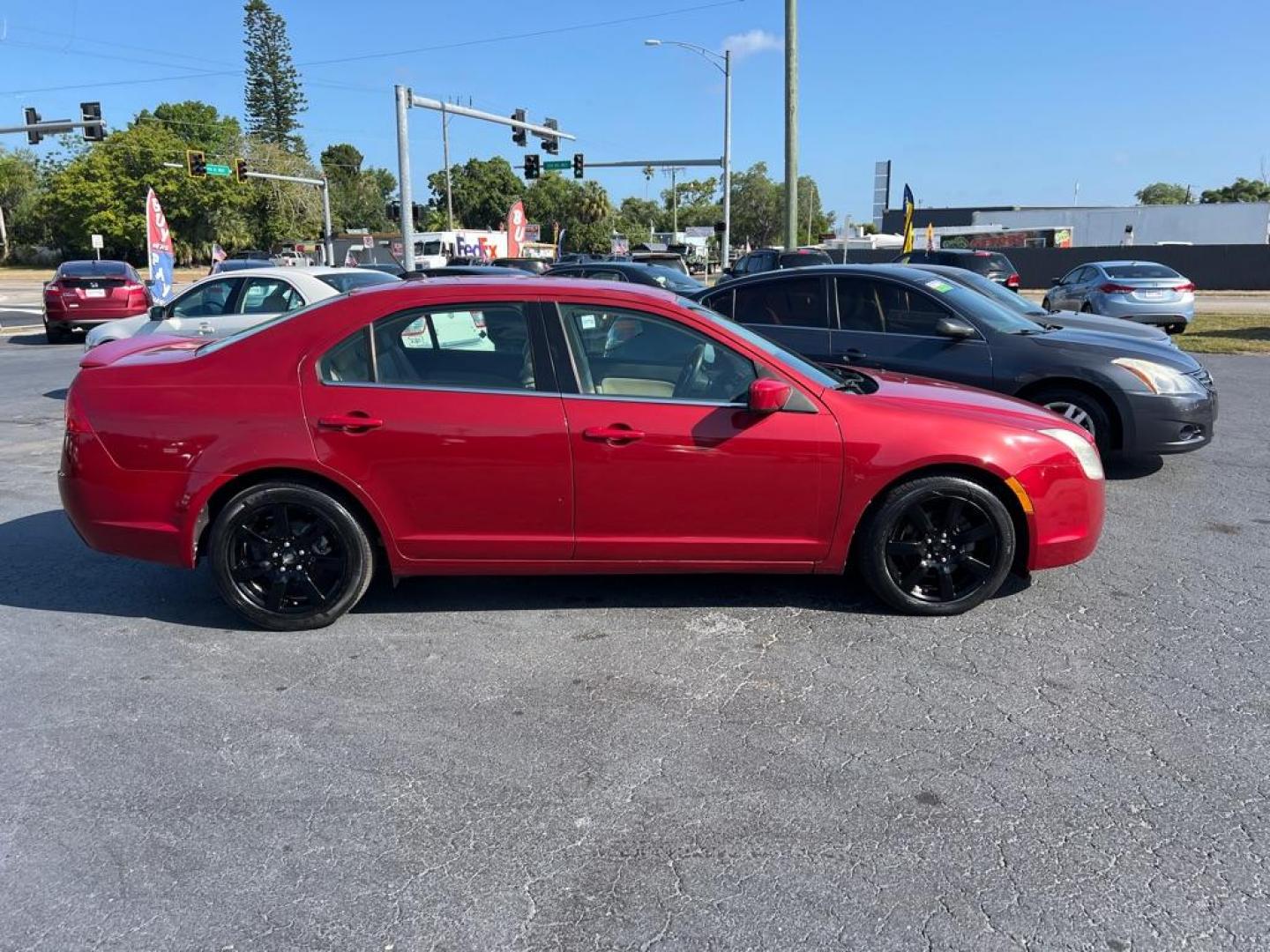 2010 RED MERCURY MILAN PREMIER (3MEHM0JA4AR) with an 2.5L engine, Automatic transmission, located at 2929 9th St. West, Bradenton, 34205, (941) 242-2810, 27.473591, -82.570679 - Photo#7