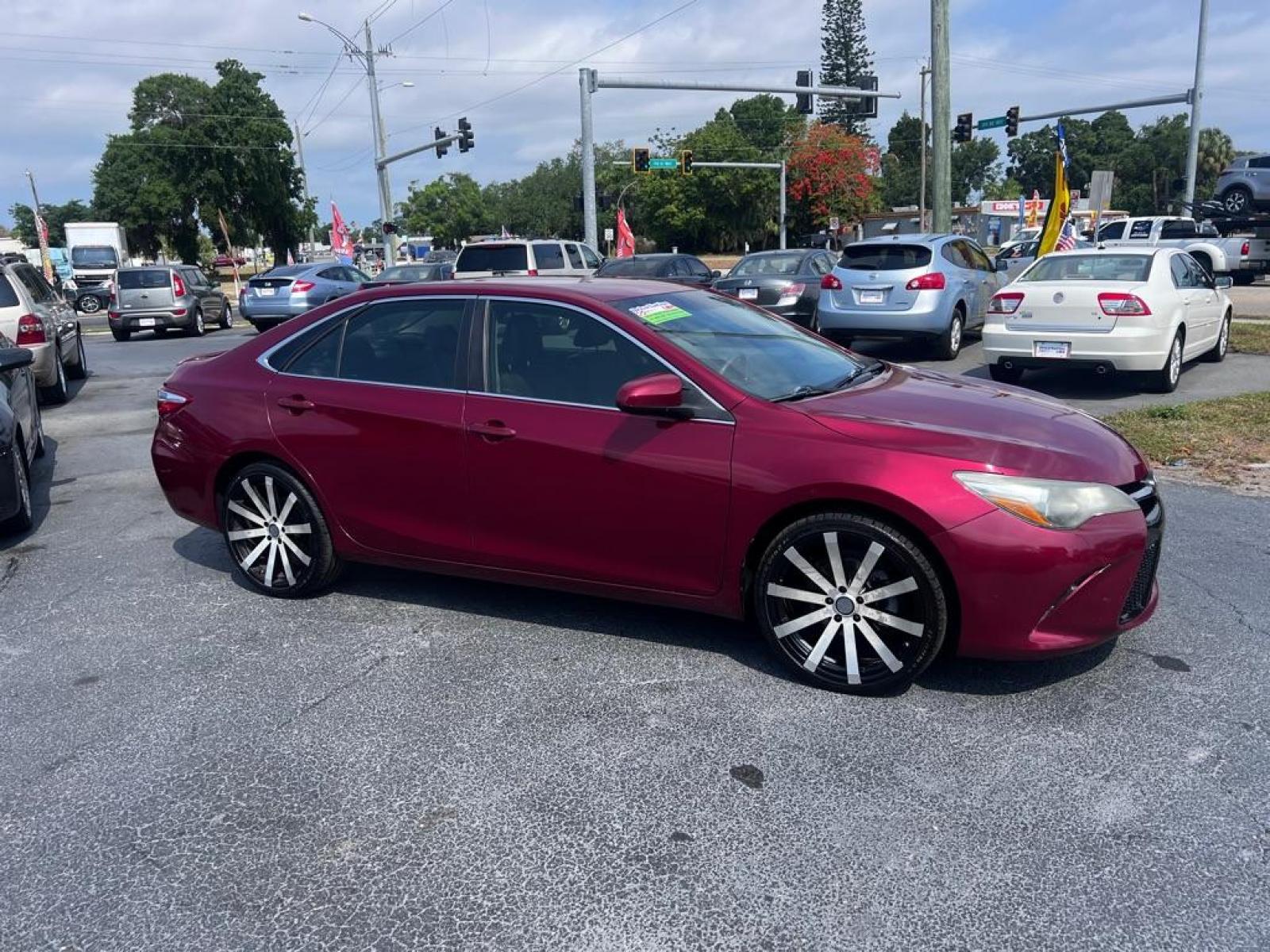 2016 RED TOYOTA CAMRY SE (4T1BF1FK8GU) with an 2.5L engine, Automatic transmission, located at 2929 9th St. West, Bradenton, 34205, (941) 242-2810, 27.473591, -82.570679 - Photo #1
