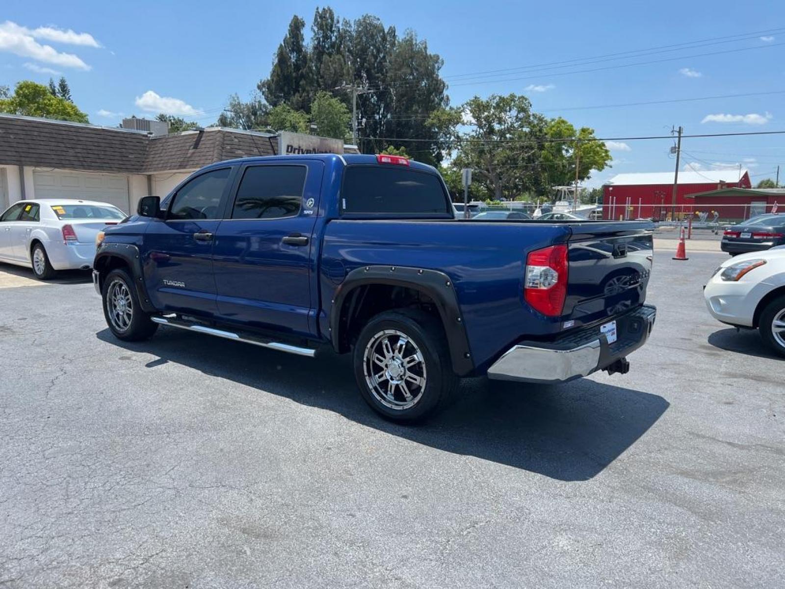 2014 BLUE TOYOTA TUNDRA CREWMAX SR5 (5TFEM5F17EX) with an 4.6L engine, Automatic transmission, located at 2929 9th St. West, Bradenton, 34205, (941) 242-2810, 27.473591, -82.570679 - Thanks for inquring into DriveNation USA! All vehicles listed can be viewed at www.drivenationusa.com for vehicle history reports and additonal info. We cannot quote any terms such as down payments or monthly payments without an application. You can apply directly at www.drivenationusa.com or by con - Photo #5