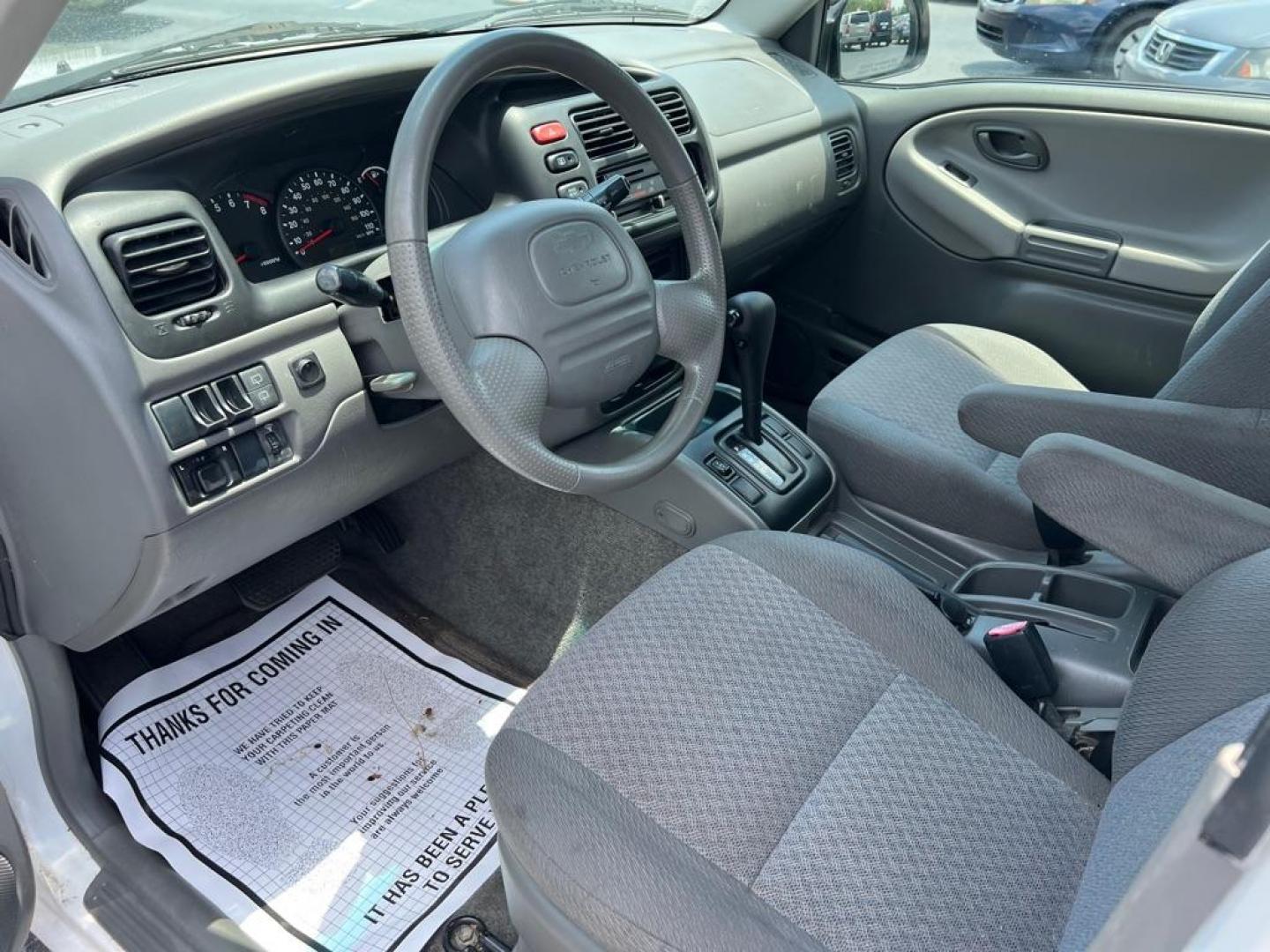 2004 WHITE CHEVROLET TRACKER (2CNBE134646) with an 2.5L engine, Automatic transmission, located at 2929 9th St. West, Bradenton, 34205, (941) 242-2810, 27.473591, -82.570679 - Thanks for inquring into DriveNation USA! All vehicles listed can be viewed at www.drivenationusa.com for vehicle history reports and additonal info. We cannot quote any terms such as down payments or monthly payments without an application. You can apply directly at www.drivenationusa.com or by con - Photo#9