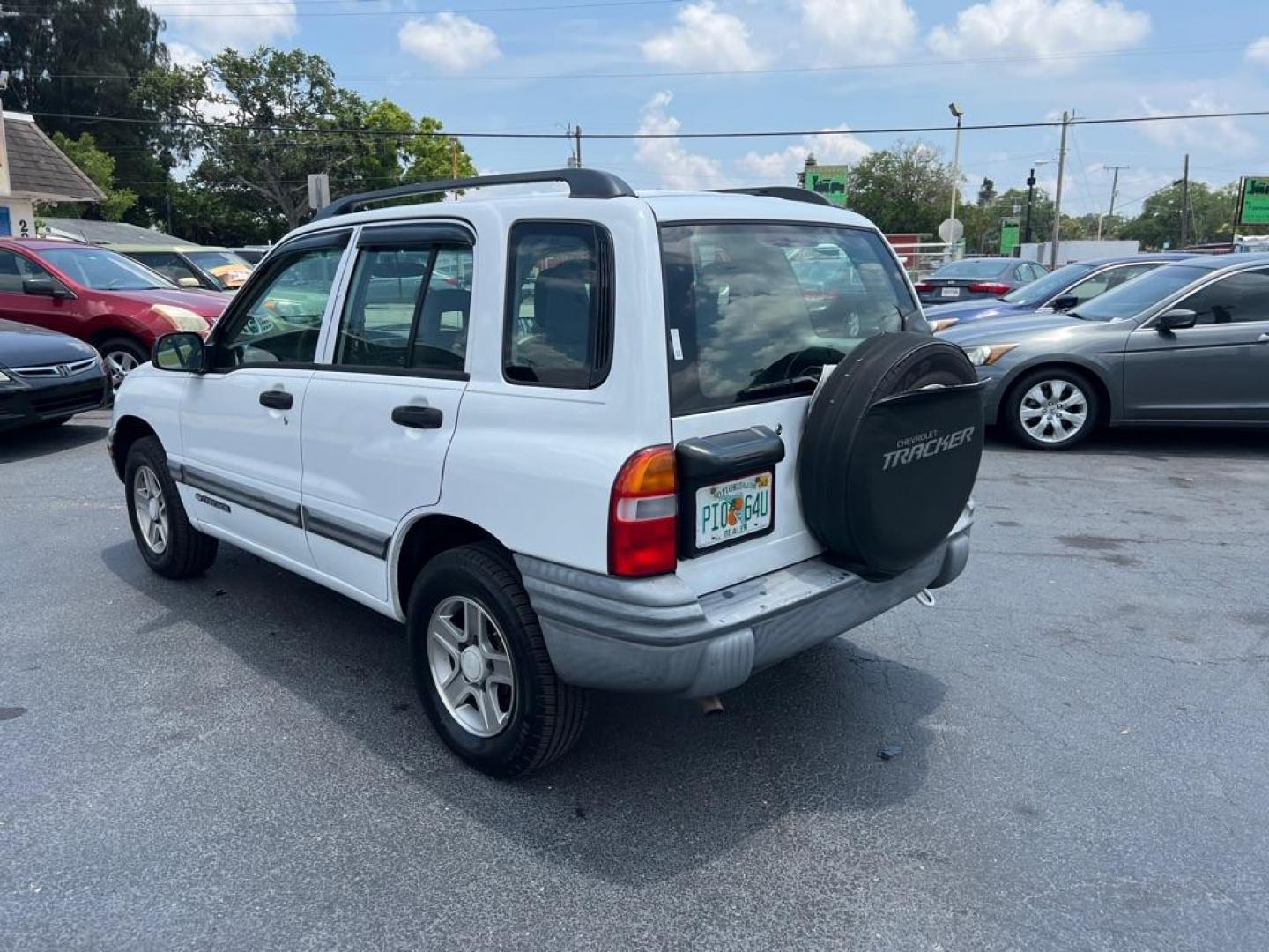 2004 WHITE CHEVROLET TRACKER (2CNBE134646) with an 2.5L engine, Automatic transmission, located at 2929 9th St. West, Bradenton, 34205, (941) 242-2810, 27.473591, -82.570679 - Thanks for inquring into DriveNation USA! All vehicles listed can be viewed at www.drivenationusa.com for vehicle history reports and additonal info. We cannot quote any terms such as down payments or monthly payments without an application. You can apply directly at www.drivenationusa.com or by con - Photo#5