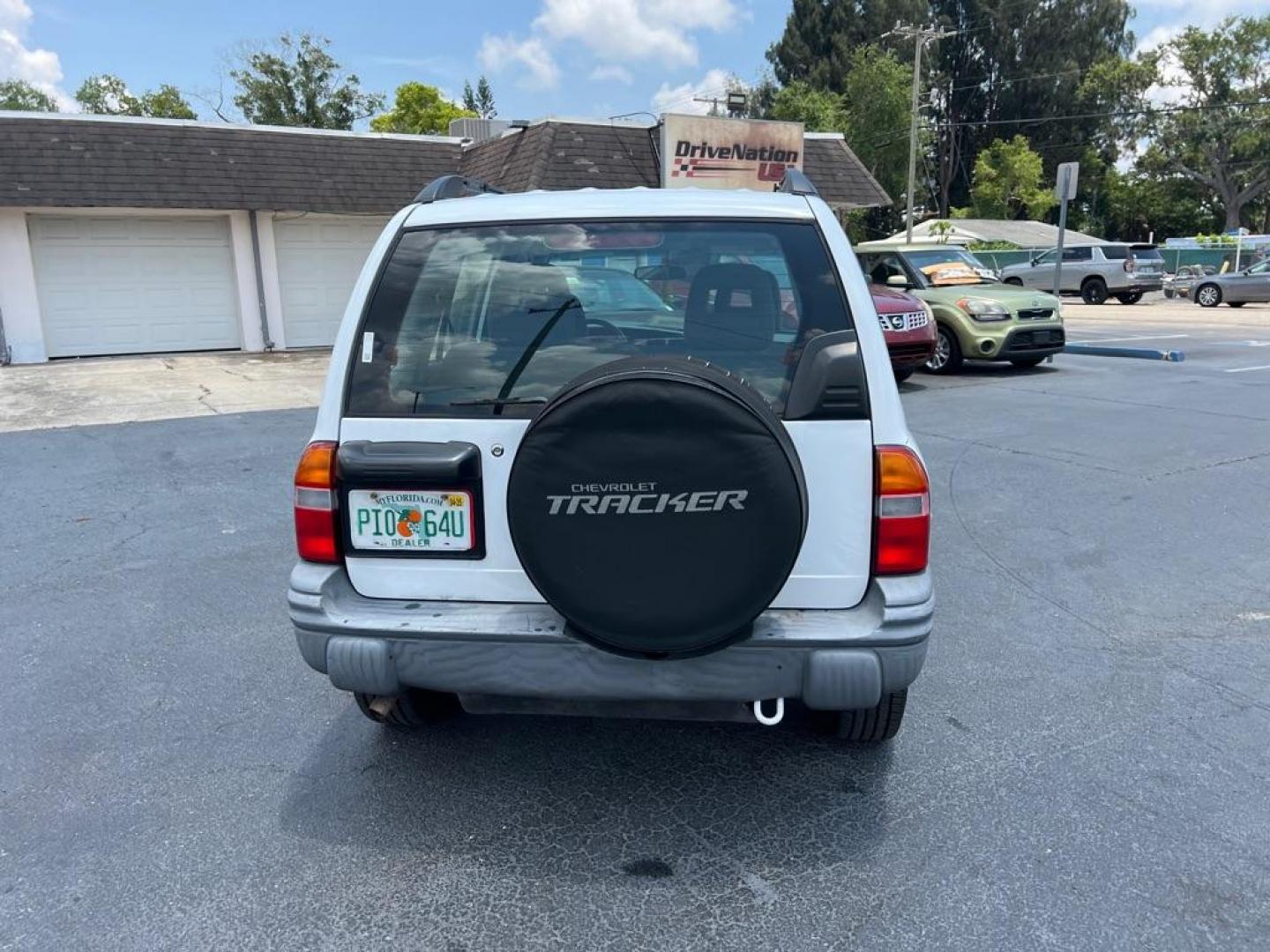 2004 WHITE CHEVROLET TRACKER (2CNBE134646) with an 2.5L engine, Automatic transmission, located at 2929 9th St. West, Bradenton, 34205, (941) 242-2810, 27.473591, -82.570679 - Thanks for inquring into DriveNation USA! All vehicles listed can be viewed at www.drivenationusa.com for vehicle history reports and additonal info. We cannot quote any terms such as down payments or monthly payments without an application. You can apply directly at www.drivenationusa.com or by con - Photo#6