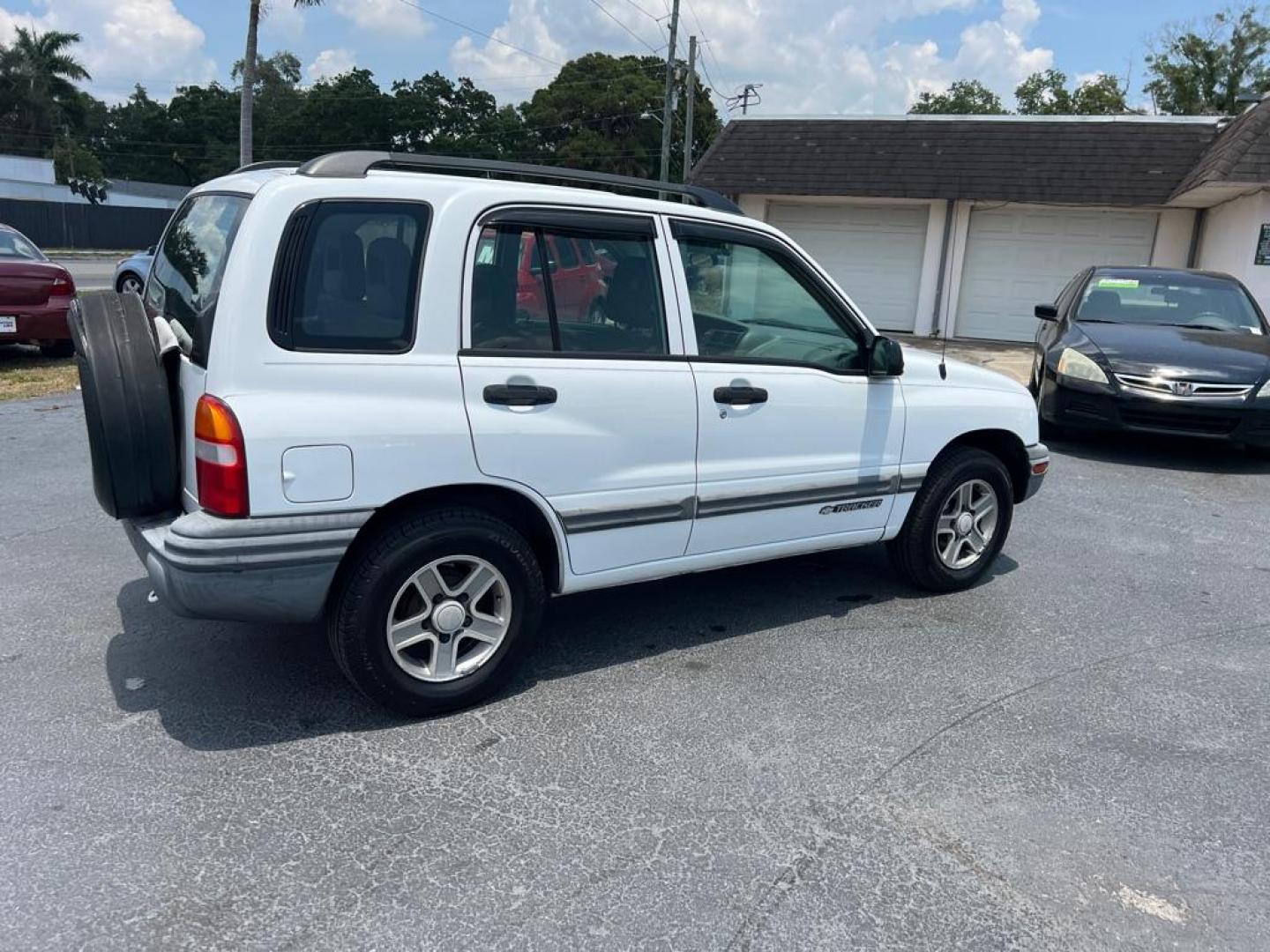 2004 WHITE CHEVROLET TRACKER (2CNBE134646) with an 2.5L engine, Automatic transmission, located at 2929 9th St. West, Bradenton, 34205, (941) 242-2810, 27.473591, -82.570679 - Thanks for inquring into DriveNation USA! All vehicles listed can be viewed at www.drivenationusa.com for vehicle history reports and additonal info. We cannot quote any terms such as down payments or monthly payments without an application. You can apply directly at www.drivenationusa.com or by con - Photo#7