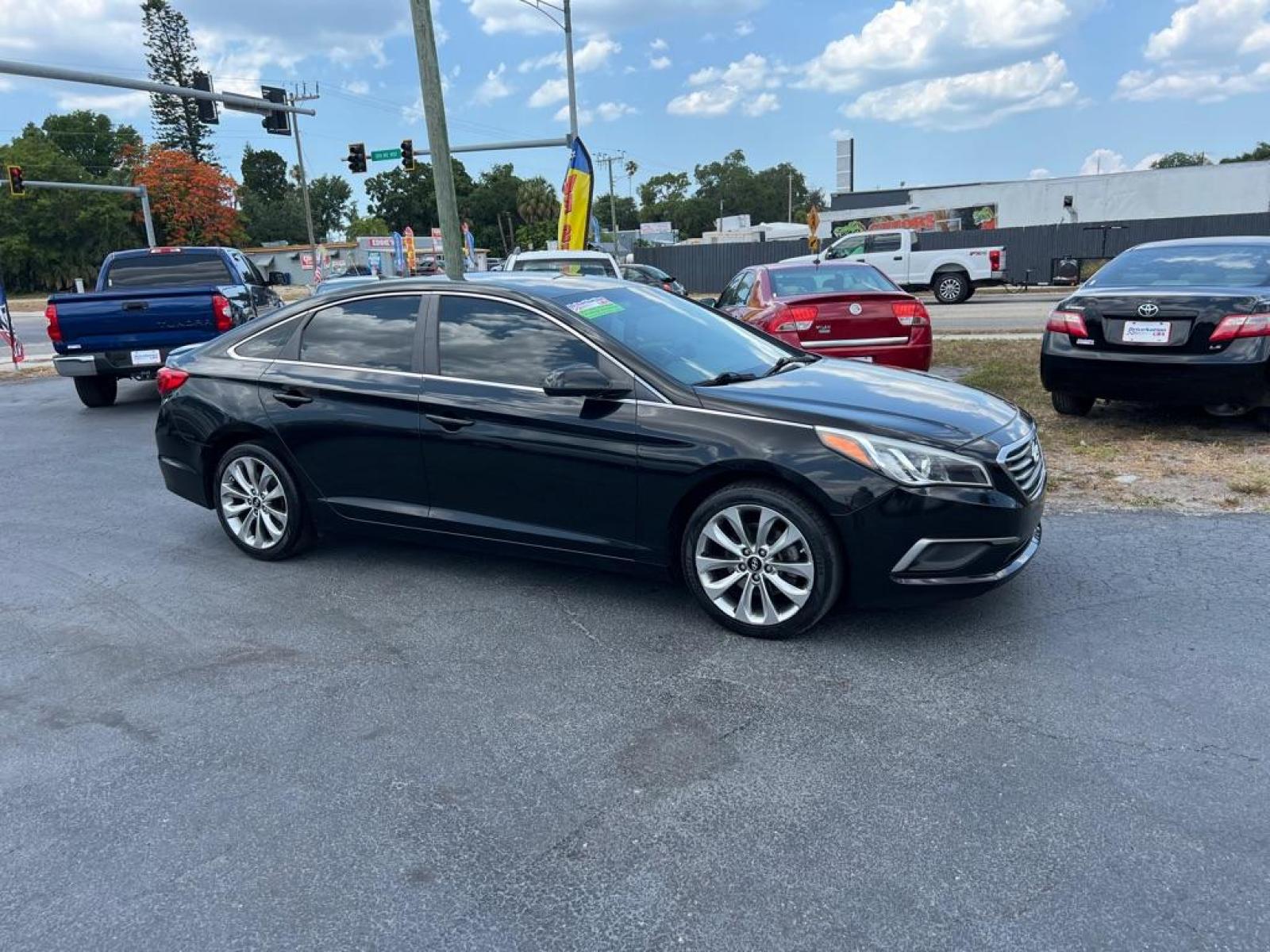 2017 BLACK HYUNDAI SONATA SE (5NPE24AF3HH) with an 2.4L engine, Automatic transmission, located at 2929 9th St. West, Bradenton, 34205, (941) 242-2810, 27.473591, -82.570679 - Thanks for inquring into DriveNation USA! All vehicles listed can be viewed at www.drivenationusa.com for vehicle history reports and additonal info. We cannot quote any terms such as down payments or monthly payments without an application. You can apply directly at www.drivenationusa.com or by con - Photo #2