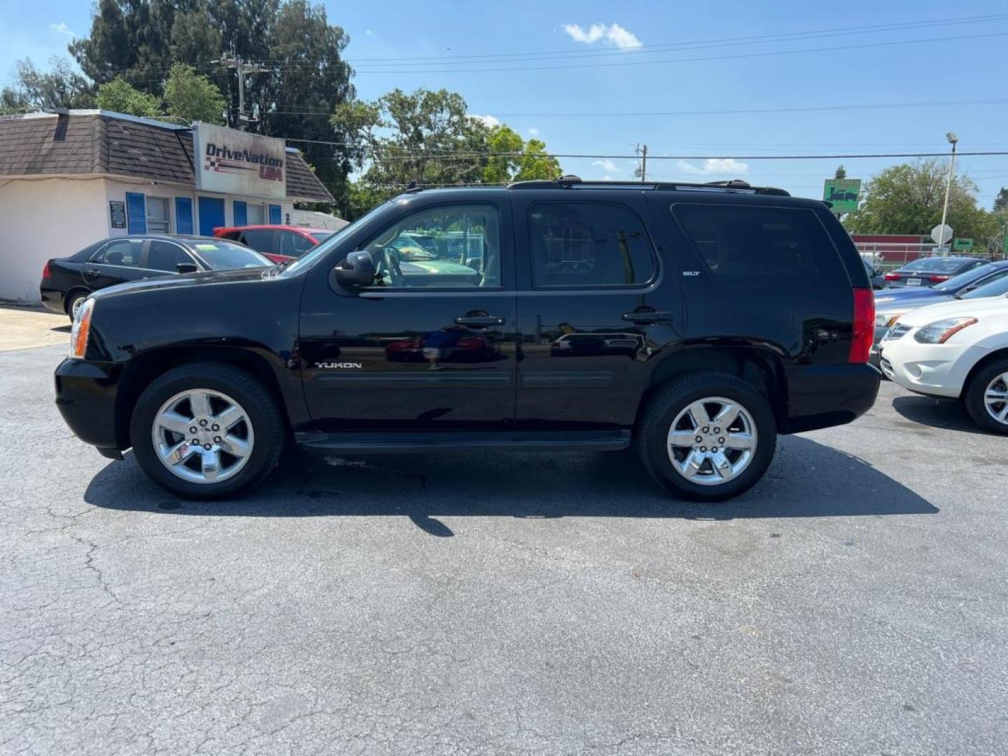 2013 BLACK GMC YUKON SLT (1GKS1CE04DR) with an 5.3L engine, Automatic transmission, located at 2929 9th St. West, Bradenton, 34205, (941) 242-2810, 27.473591, -82.570679 - Thanks for inquring into DriveNation USA! All vehicles listed can be viewed at www.drivenationusa.com for vehicle history reports and additonal info. We cannot quote any terms such as down payments or monthly payments without an application. You can apply directly at www.drivenationusa.com or by con - Photo#5