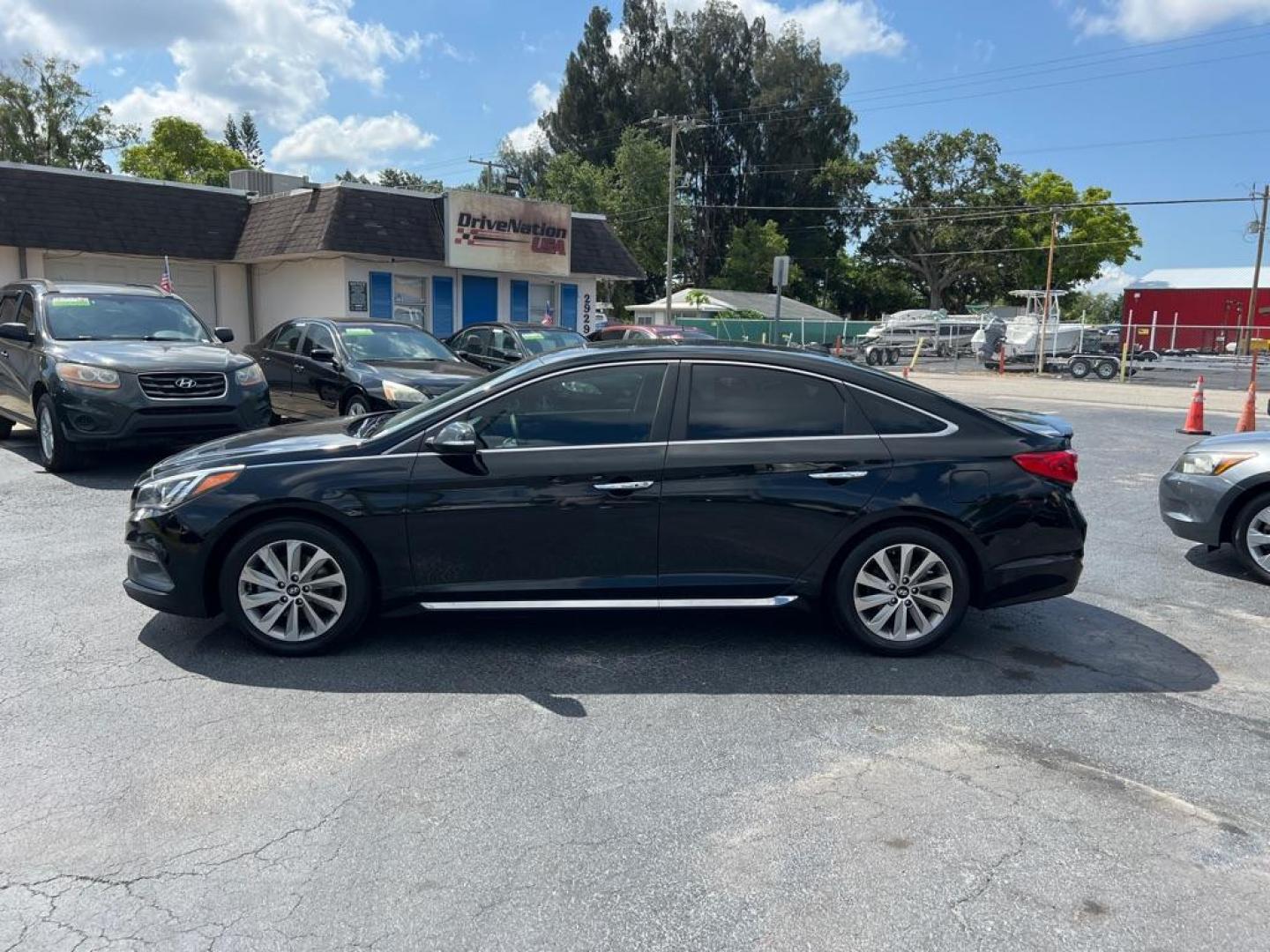 2017 BLACK HYUNDAI SONATA SPORT (5NPE34AF6HH) with an 2.4L engine, Automatic transmission, located at 2929 9th St. West, Bradenton, 34205, (941) 242-2810, 27.473591, -82.570679 - Thanks for inquring into DriveNation USA! All vehicles listed can be viewed at www.drivenationusa.com for vehicle history reports and additonal info. We cannot quote any terms such as down payments or monthly payments without an application. You can apply directly at www.drivenationusa.com or by con - Photo#5