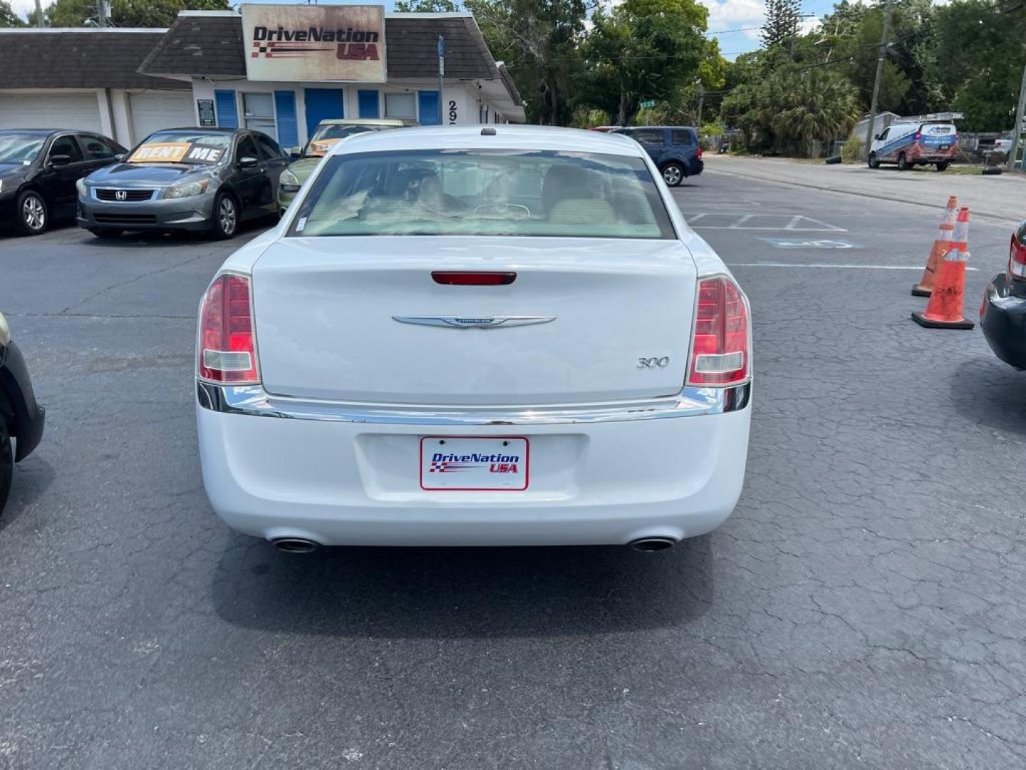 2012 WHITE CHRYSLER 300 S (2C3CCAAG4CH) with an 3.6L engine, Automatic transmission, located at 2929 9th St. West, Bradenton, 34205, (941) 242-2810, 27.473591, -82.570679 - Thanks for inquring into DriveNation USA! All vehicles listed can be viewed at www.drivenationusa.com for vehicle history reports and additonal info. We cannot quote any terms such as down payments or monthly payments without an application. You can apply directly at www.drivenationusa.com or by con - Photo#3