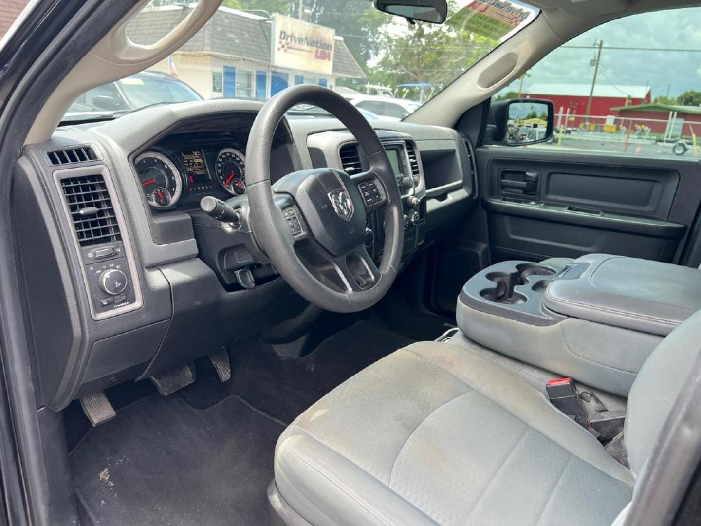 2018 BLACK RAM 1500 EXPRESS (1C6RR6KT0JS) with an 5.7L engine, Automatic transmission, located at 2929 9th St. West, Bradenton, 34205, (941) 242-2810, 27.473591, -82.570679 - Thanks for inquring into DriveNation USA! All vehicles listed can be viewed at www.drivenationusa.com for vehicle history reports and additonal info. We cannot quote any terms such as down payments or monthly payments without an application. You can apply directly at www.drivenationusa.com or by con - Photo#14