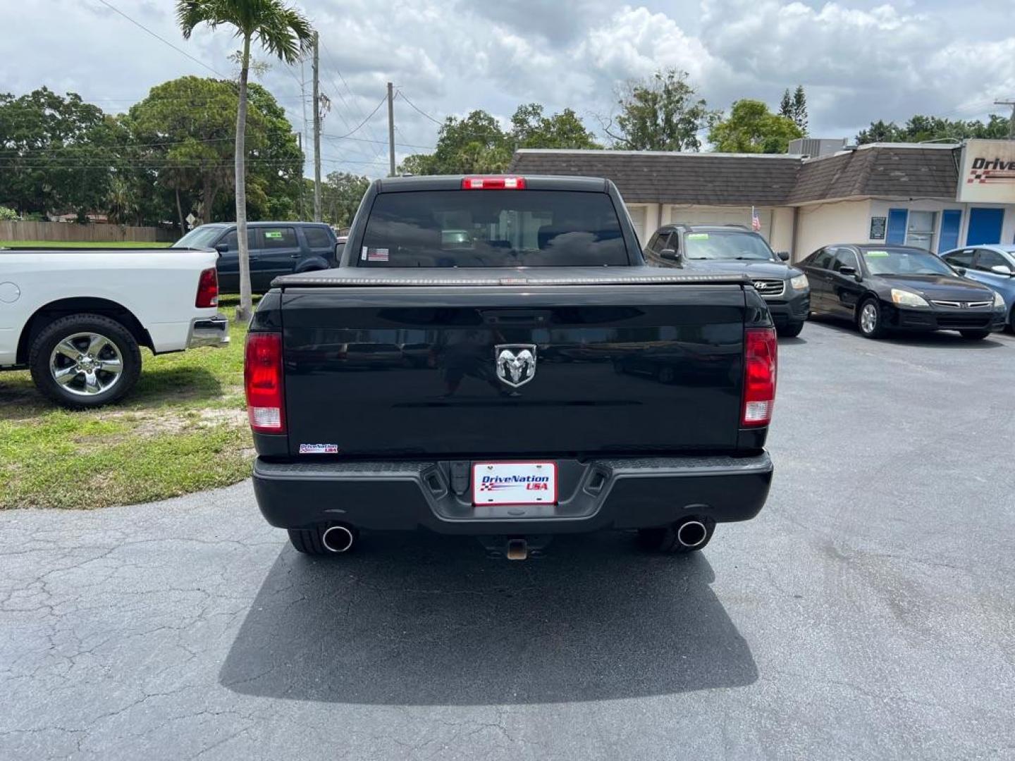 2018 BLACK RAM 1500 EXPRESS (1C6RR6KT0JS) with an 5.7L engine, Automatic transmission, located at 2929 9th St. West, Bradenton, 34205, (941) 242-2810, 27.473591, -82.570679 - Thanks for inquring into DriveNation USA! All vehicles listed can be viewed at www.drivenationusa.com for vehicle history reports and additonal info. We cannot quote any terms such as down payments or monthly payments without an application. You can apply directly at www.drivenationusa.com or by con - Photo#6