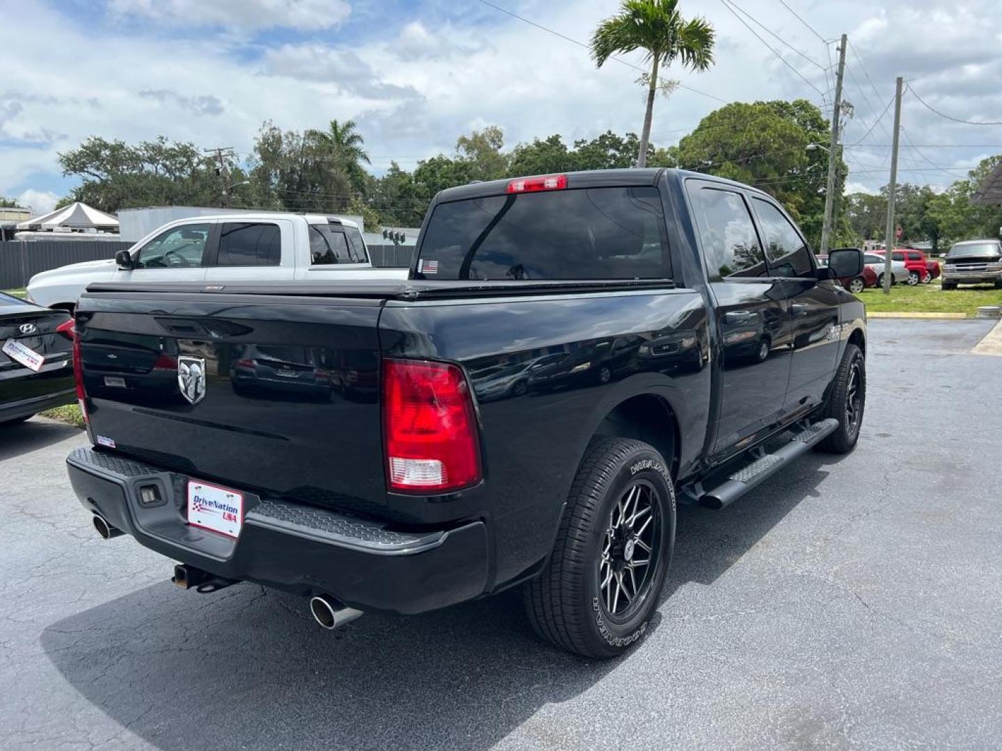 2018 BLACK RAM 1500 EXPRESS (1C6RR6KT0JS) with an 5.7L engine, Automatic transmission, located at 2929 9th St. West, Bradenton, 34205, (941) 242-2810, 27.473591, -82.570679 - Thanks for inquring into DriveNation USA! All vehicles listed can be viewed at www.drivenationusa.com for vehicle history reports and additonal info. We cannot quote any terms such as down payments or monthly payments without an application. You can apply directly at www.drivenationusa.com or by con - Photo#7