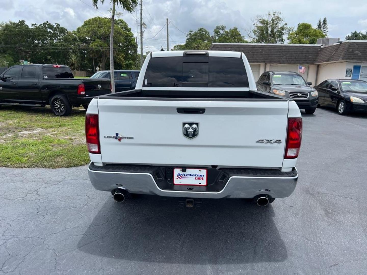 2014 WHITE RAM 1500 LONESTAR (1C6RR7LT2ES) with an 5.7L engine, Automatic transmission, located at 2929 9th St. West, Bradenton, 34205, (941) 242-2810, 27.473591, -82.570679 - Thanks for inquring into DriveNation USA! All vehicles listed can be viewed at www.drivenationusa.com for vehicle history reports and additonal info. We cannot quote any terms such as down payments or monthly payments without an application. You can apply directly at www.drivenationusa.com or by con - Photo#4