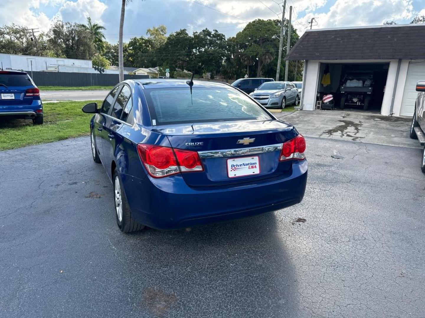 2012 BLUE CHEVROLET CRUZE LS (1G1PC5SH5C7) with an 1.8L engine, Automatic transmission, located at 2929 9th St. West, Bradenton, 34205, (941) 242-2810, 27.473591, -82.570679 - Photo#7