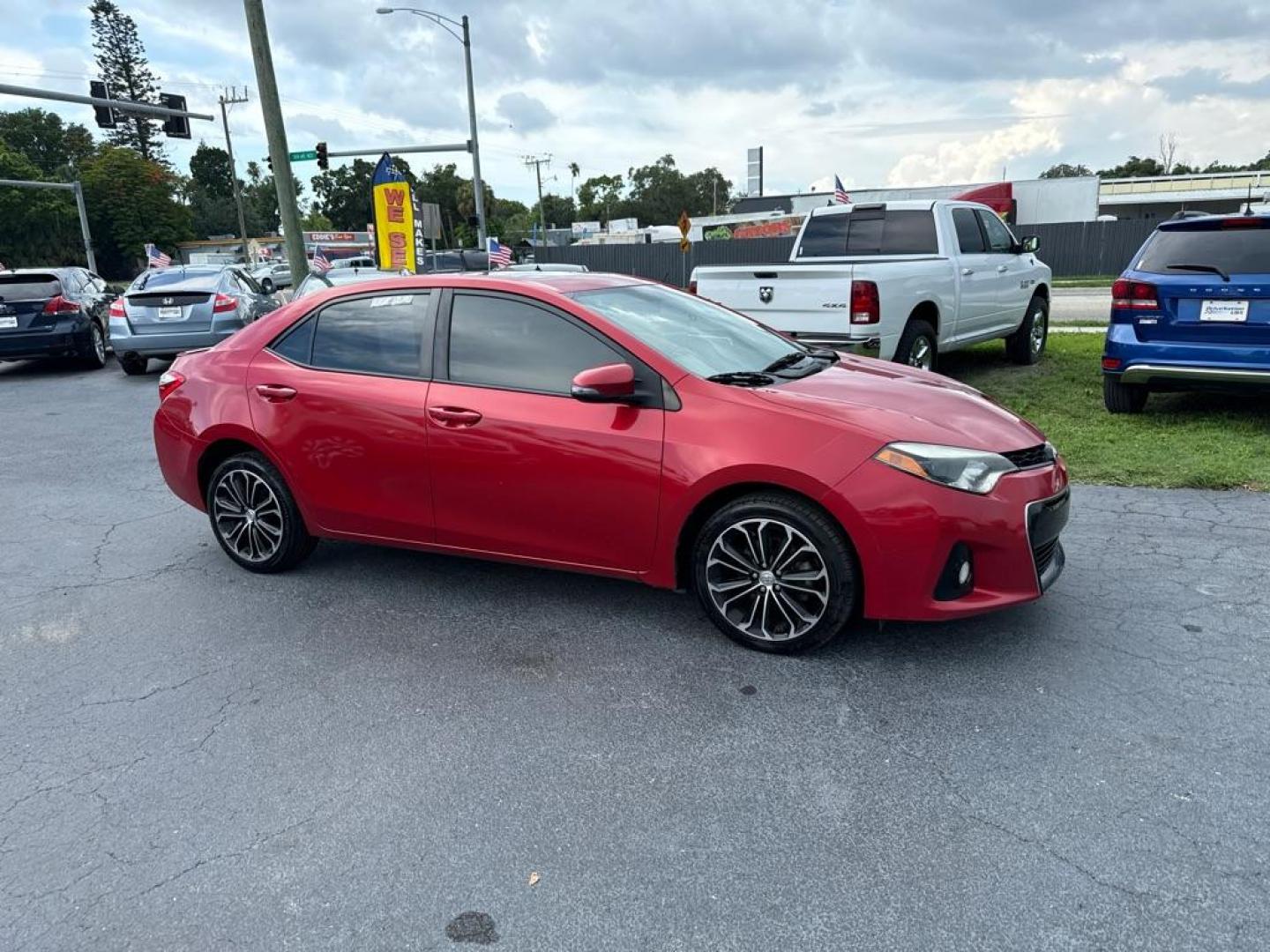 2015 RED TOYOTA COROLLA LE (5YFBURHE1FP) with an 1.8L engine, Automatic transmission, located at 2929 9th St. West, Bradenton, 34205, (941) 242-2810, 27.473591, -82.570679 - Photo#1