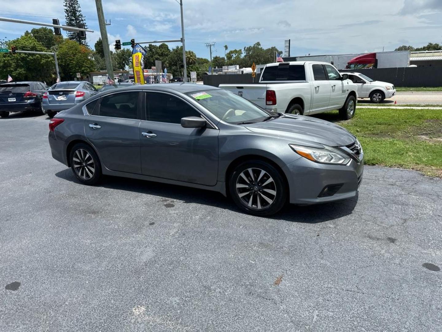 2016 GRAY NISSAN ALTIMA 2.5 (1N4AL3AP2GC) with an 2.5L engine, Continuously Variable transmission, located at 2929 9th St. West, Bradenton, 34205, (941) 242-2810, 27.473591, -82.570679 - Photo#0