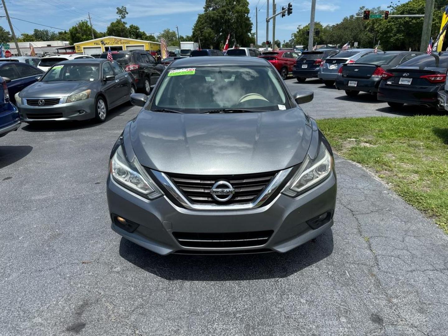 2016 GRAY NISSAN ALTIMA 2.5 (1N4AL3AP2GC) with an 2.5L engine, Continuously Variable transmission, located at 2929 9th St. West, Bradenton, 34205, (941) 242-2810, 27.473591, -82.570679 - Photo#2