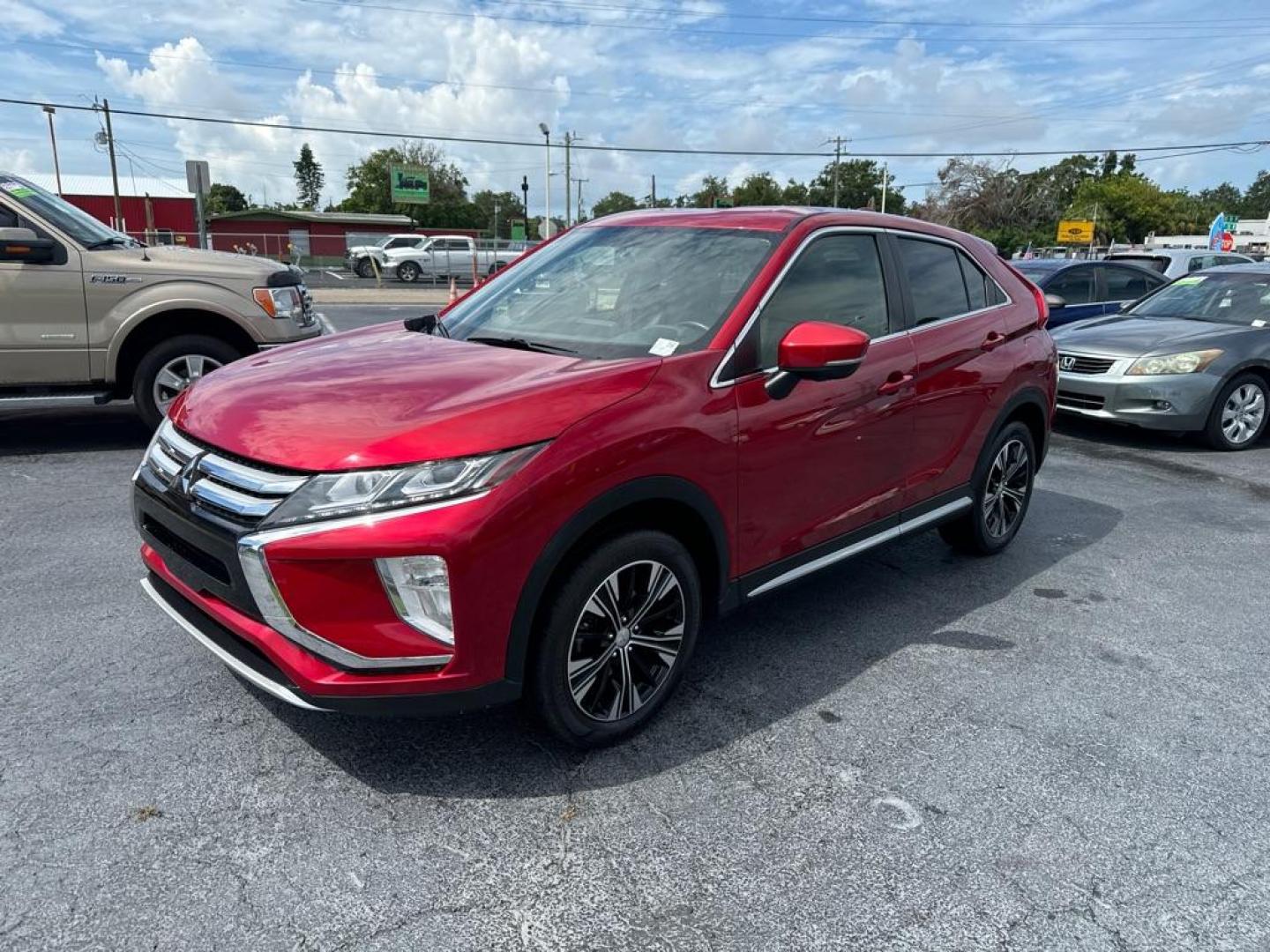 2019 RED MITSUBISHI ECLIPSE CROSS SEL (JA4AT5AA9KZ) with an 1.5L engine, Automatic transmission, located at 2929 9th St. West, Bradenton, 34205, (941) 242-2810, 27.473591, -82.570679 - Photo#3