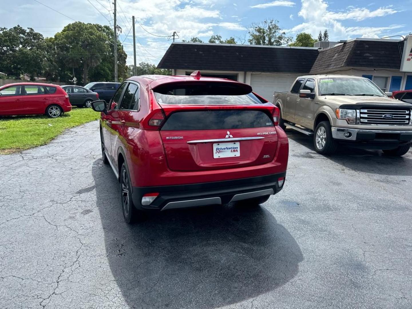 2019 RED MITSUBISHI ECLIPSE CROSS SEL (JA4AT5AA9KZ) with an 1.5L engine, Automatic transmission, located at 2929 9th St. West, Bradenton, 34205, (941) 242-2810, 27.473591, -82.570679 - Photo#5