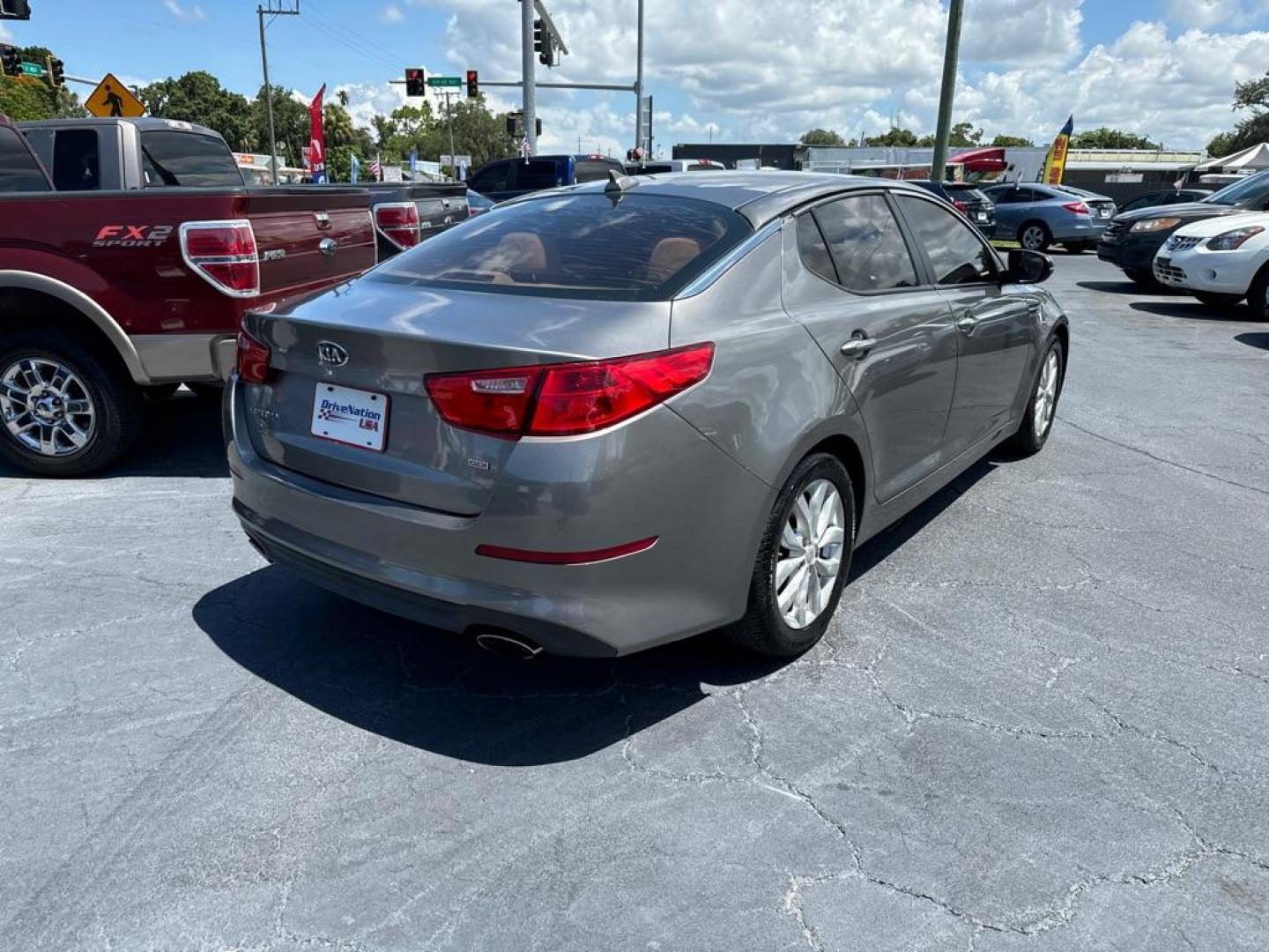 2014 GRAY KIA OPTIMA LX (5XXGM4A77EG) with an 2.4L engine, Automatic transmission, located at 2929 9th St. West, Bradenton, 34205, (941) 242-2810, 27.473591, -82.570679 - Thanks for inquring into DriveNation USA! All vehicles listed can be viewed at www.drivenationusa.com for vehicle history reports and additonal info. We cannot quote any terms such as down payments or monthly payments without an application. You can apply directly at www.drivenationusa.com or by con - Photo#5