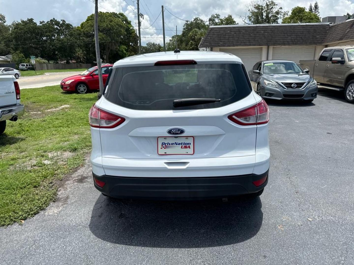 2015 WHITE FORD ESCAPE S (1FMCU0F75FU) with an 2.5L engine, Automatic transmission, located at 2929 9th St. West, Bradenton, 34205, (941) 242-2810, 27.473591, -82.570679 - Thanks for inquring into DriveNation USA! All vehicles listed can be viewed at www.drivenationusa.com for vehicle history reports and additonal info. We cannot quote any terms such as down payments or monthly payments without an application. You can apply directly at www.drivenationusa.com or by con - Photo#5