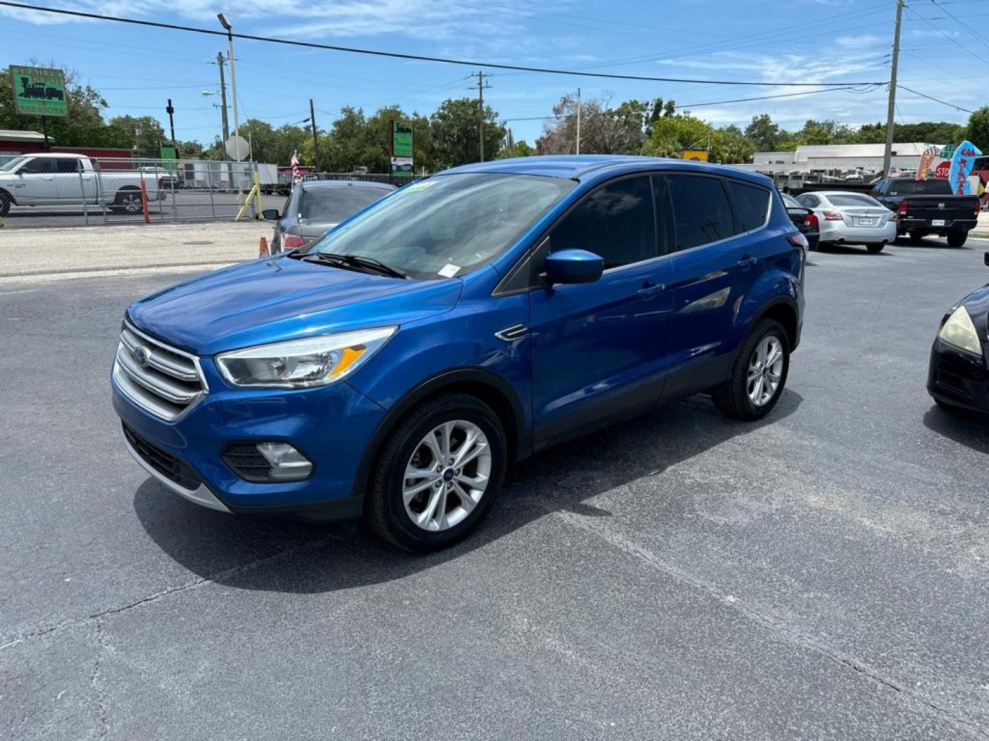 2017 BLUE FORD ESCAPE SE (1FMCU0GD8HU) with an 1.5L engine, Automatic transmission, located at 2929 9th St. West, Bradenton, 34205, (941) 242-2810, 27.473591, -82.570679 - Photo#3