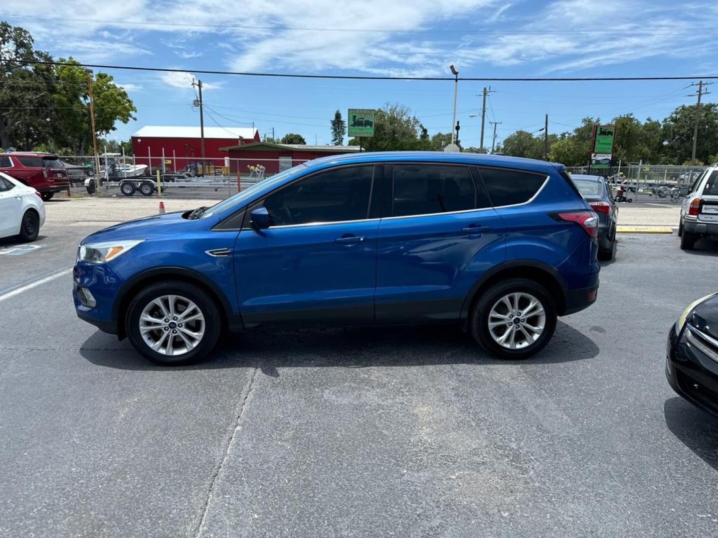 2017 BLUE FORD ESCAPE SE (1FMCU0GD8HU) with an 1.5L engine, Automatic transmission, located at 2929 9th St. West, Bradenton, 34205, (941) 242-2810, 27.473591, -82.570679 - Thanks for inquring into DriveNation USA! All vehicles listed can be viewed at www.drivenationusa.com for vehicle history reports and additonal info. We cannot quote any terms such as down payments or monthly payments without an application. You can apply directly at www.drivenationusa.com or by con - Photo#4