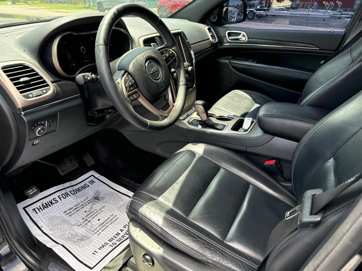 2017 BLACK JEEP GRAND CHEROKEE LIMITED (1C4RJEBG0HC) with an 3.6L engine, Automatic transmission, located at 2929 9th St. West, Bradenton, 34205, (941) 242-2810, 27.473591, -82.570679 - Photo#9