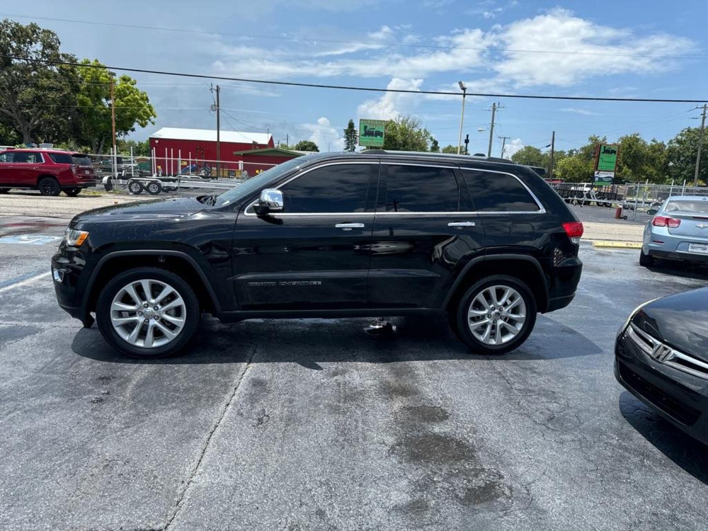 2017 BLACK JEEP GRAND CHEROKEE LIMITED (1C4RJEBG0HC) with an 3.6L engine, Automatic transmission, located at 2929 9th St. West, Bradenton, 34205, (941) 242-2810, 27.473591, -82.570679 - Photo#5