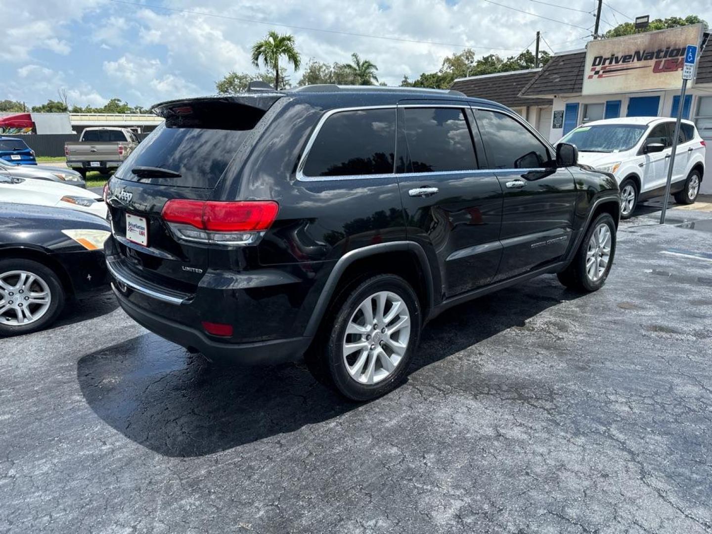 2017 BLACK JEEP GRAND CHEROKEE LIMITED (1C4RJEBG0HC) with an 3.6L engine, Automatic transmission, located at 2929 9th St. West, Bradenton, 34205, (941) 242-2810, 27.473591, -82.570679 - Thanks for inquring into DriveNation USA! All vehicles listed can be viewed at www.drivenationusa.com for vehicle history reports and additonal info. We cannot quote any terms such as down payments or monthly payments without an application. You can apply directly at www.drivenationusa.com or by con - Photo#7