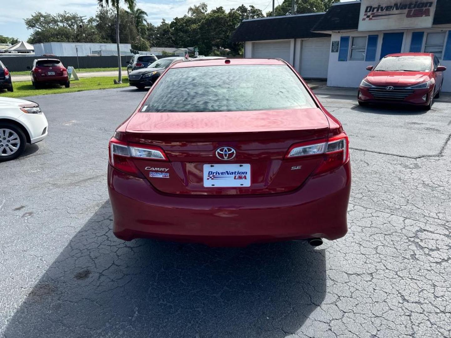 2014 RED TOYOTA CAMRY SE (4T1BF1FK6EU) with an 2.5L engine, Automatic transmission, located at 2929 9th St. West, Bradenton, 34205, (941) 242-2810, 27.473591, -82.570679 - Thanks for inquring into DriveNation USA! All vehicles listed can be viewed at www.drivenationusa.com for vehicle history reports and additonal info. We cannot quote any terms such as down payments or monthly payments without an application. You can apply directly at www.drivenationusa.com or by con - Photo#6