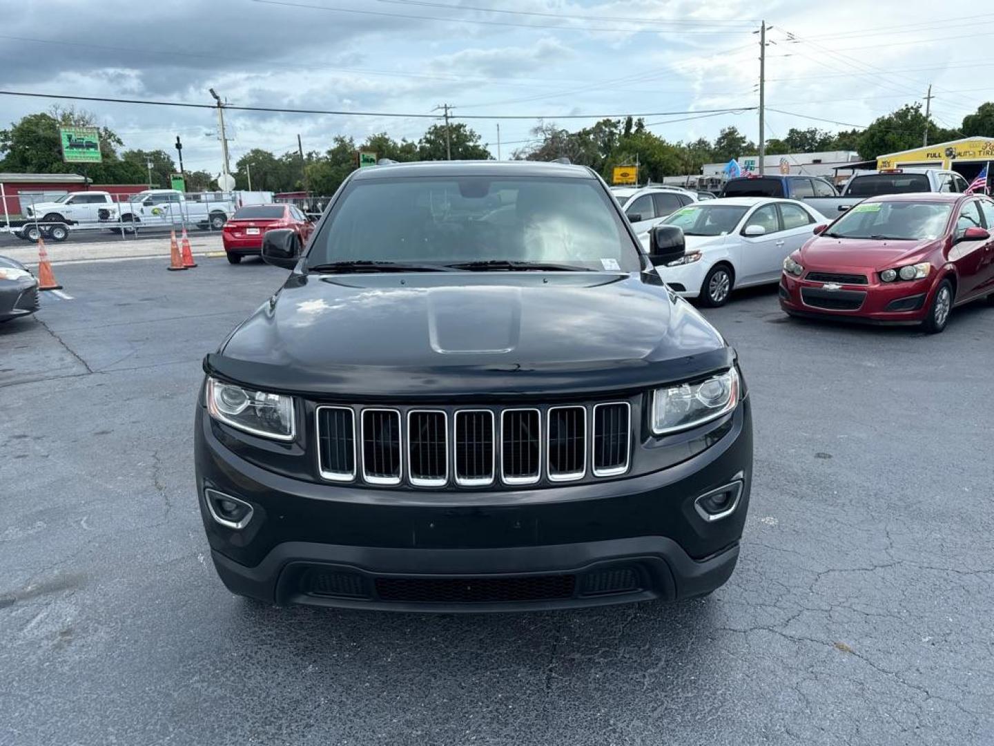 2015 BLACK JEEP GRAND CHEROKEE LAREDO (1C4RJFAG4FC) with an 3.6L engine, Automatic transmission, located at 2929 9th St. West, Bradenton, 34205, (941) 242-2810, 27.473591, -82.570679 - Thanks for inquring into DriveNation USA! All vehicles listed can be viewed at www.drivenationusa.com for vehicle history reports and additonal info. We cannot quote any terms such as down payments or monthly payments without an application. You can apply directly at www.drivenationusa.com or by con - Photo#3