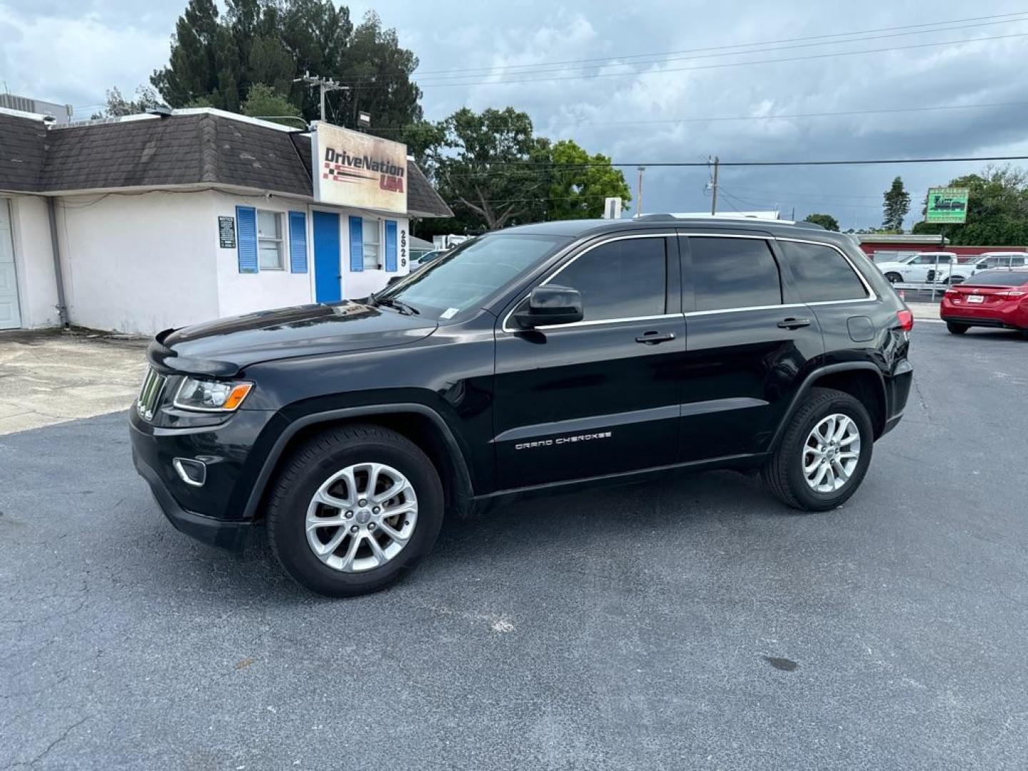 2015 BLACK JEEP GRAND CHEROKEE LAREDO (1C4RJFAG4FC) with an 3.6L engine, Automatic transmission, located at 2929 9th St. West, Bradenton, 34205, (941) 242-2810, 27.473591, -82.570679 - Thanks for inquring into DriveNation USA! All vehicles listed can be viewed at www.drivenationusa.com for vehicle history reports and additonal info. We cannot quote any terms such as down payments or monthly payments without an application. You can apply directly at www.drivenationusa.com or by con - Photo#4