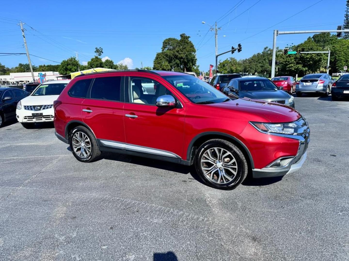 2016 RED MITSUBISHI OUTLANDER SEL (JA4AZ3A31GZ) with an 2.4L engine, Automatic transmission, located at 2929 9th St. West, Bradenton, 34205, (941) 242-2810, 27.473591, -82.570679 - Photo#0