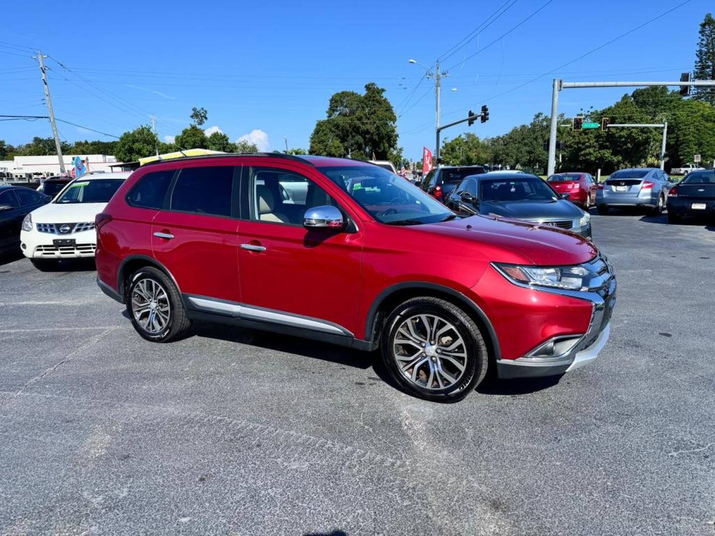 2016 RED MITSUBISHI OUTLANDER SEL (JA4AZ3A31GZ) with an 2.4L engine, Automatic transmission, located at 2929 9th St. West, Bradenton, 34205, (941) 242-2810, 27.473591, -82.570679 - Photo#16