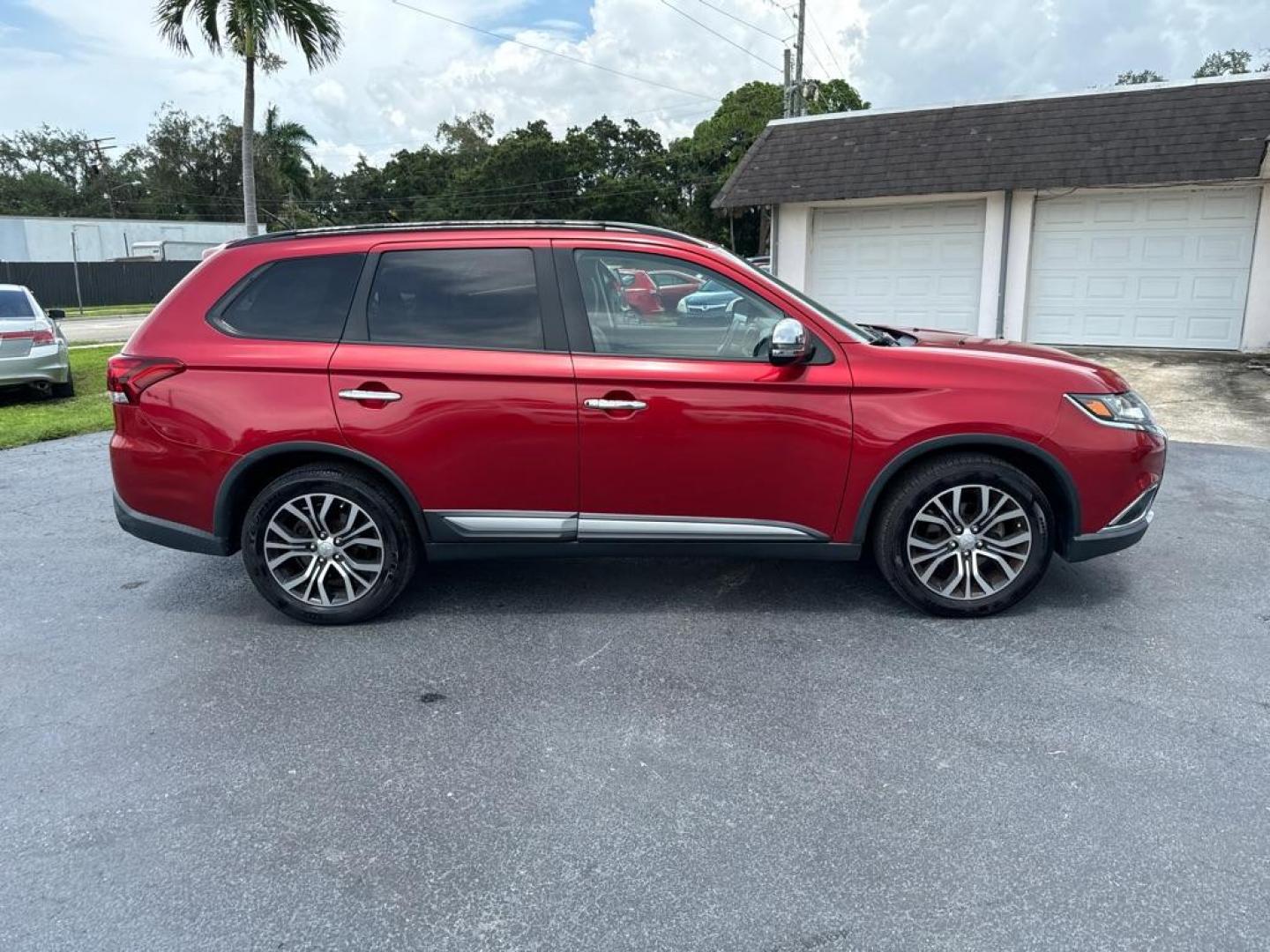 2016 RED MITSUBISHI OUTLANDER SEL (JA4AZ3A31GZ) with an 2.4L engine, Automatic transmission, located at 2929 9th St. West, Bradenton, 34205, (941) 242-2810, 27.473591, -82.570679 - Photo#8