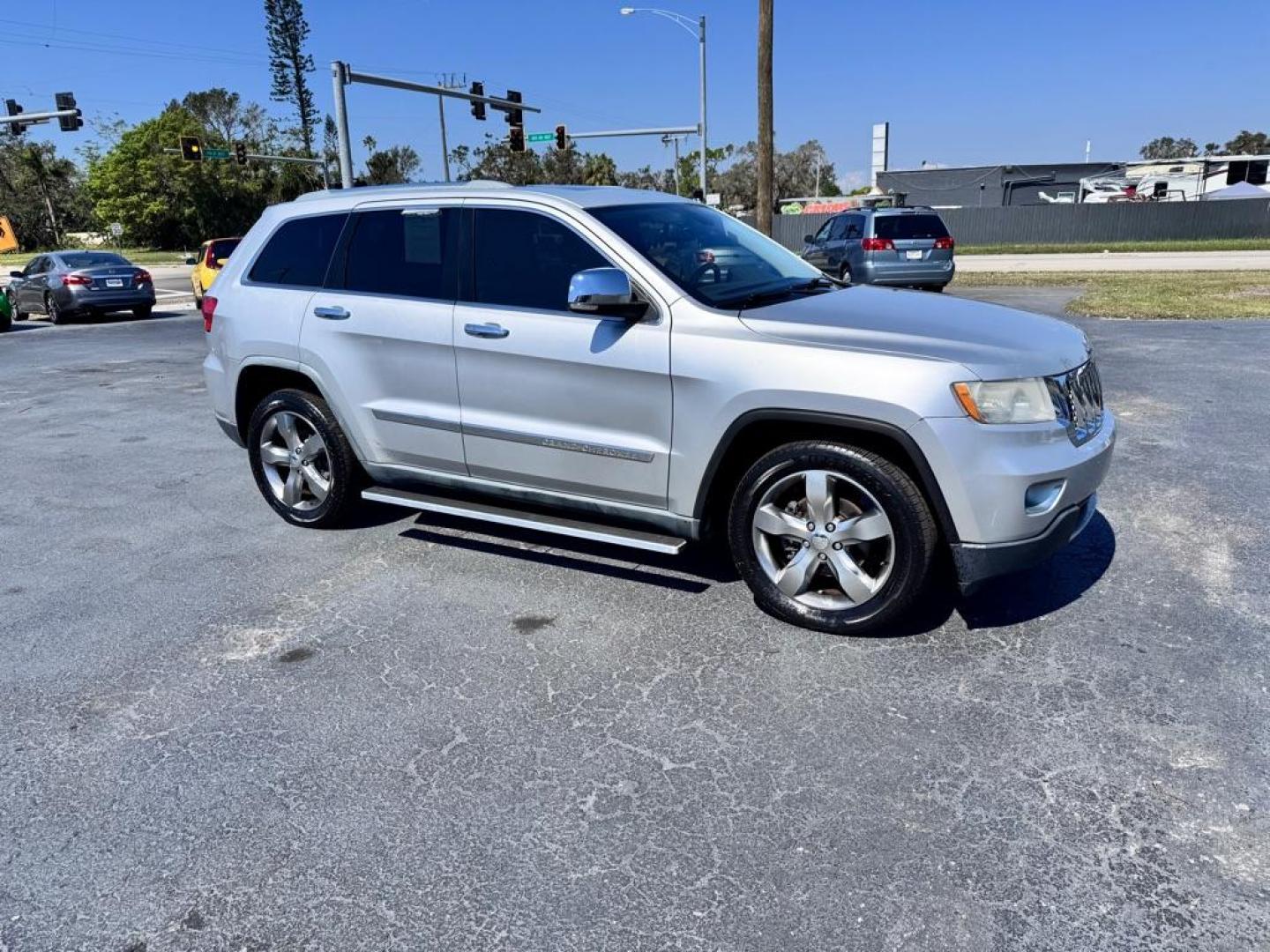 2011 SILVER JEEP GRAND CHEROKEE OVERLAND (1J4RS6GG1BC) with an 3.6L engine, Automatic transmission, located at 2929 9th St. West, Bradenton, 34205, (941) 242-2810, 27.473591, -82.570679 - Photo#0