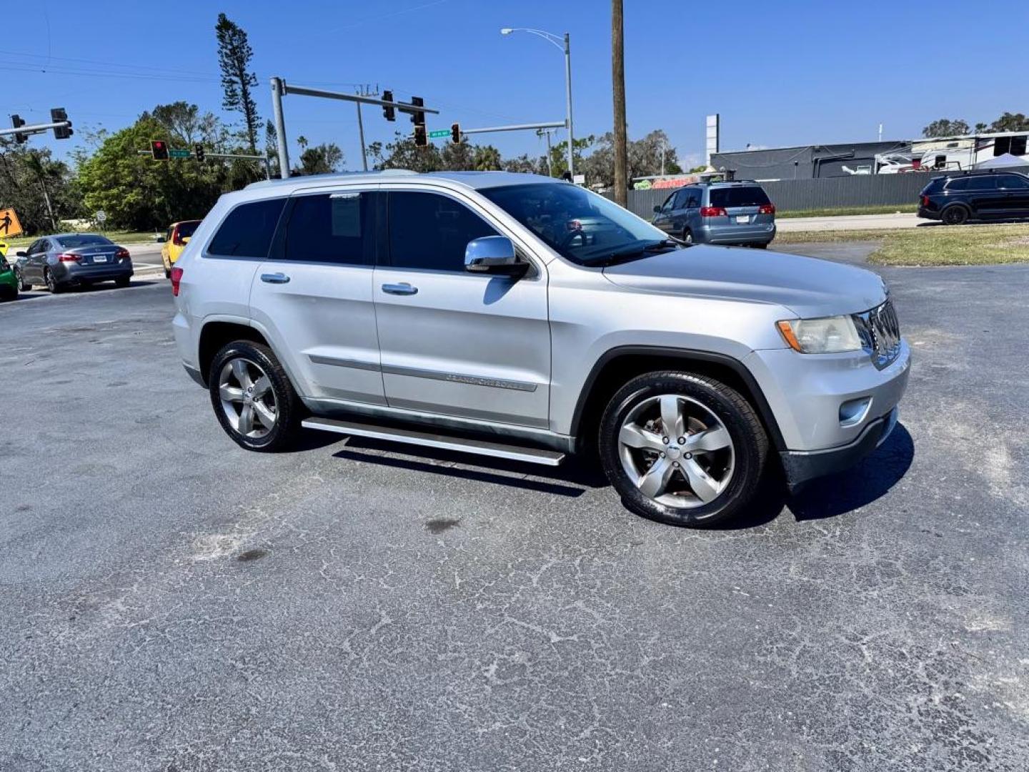 2011 SILVER JEEP GRAND CHEROKEE OVERLAND (1J4RS6GG1BC) with an 3.6L engine, Automatic transmission, located at 2929 9th St. West, Bradenton, 34205, (941) 242-2810, 27.473591, -82.570679 - Photo#1