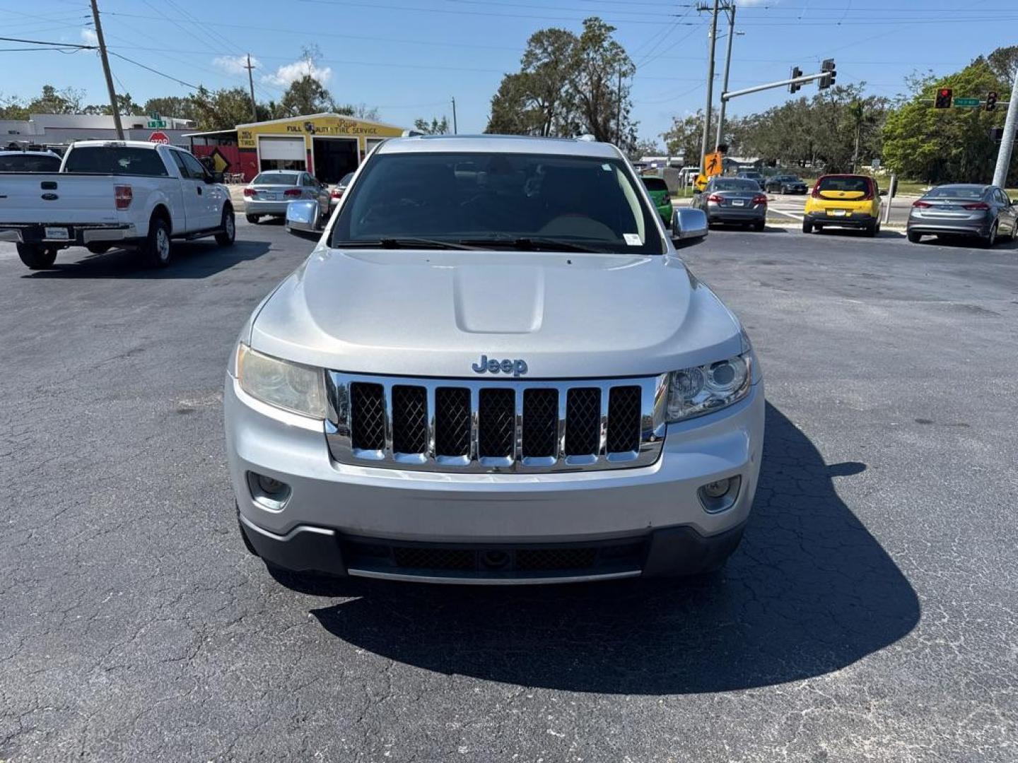 2011 SILVER JEEP GRAND CHEROKEE OVERLAND (1J4RS6GG1BC) with an 3.6L engine, Automatic transmission, located at 2929 9th St. West, Bradenton, 34205, (941) 242-2810, 27.473591, -82.570679 - Photo#2