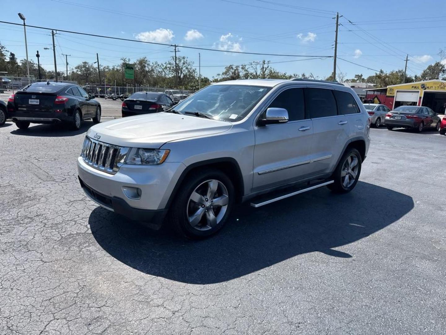 2011 SILVER JEEP GRAND CHEROKEE OVERLAND (1J4RS6GG1BC) with an 3.6L engine, Automatic transmission, located at 2929 9th St. West, Bradenton, 34205, (941) 242-2810, 27.473591, -82.570679 - Photo#3