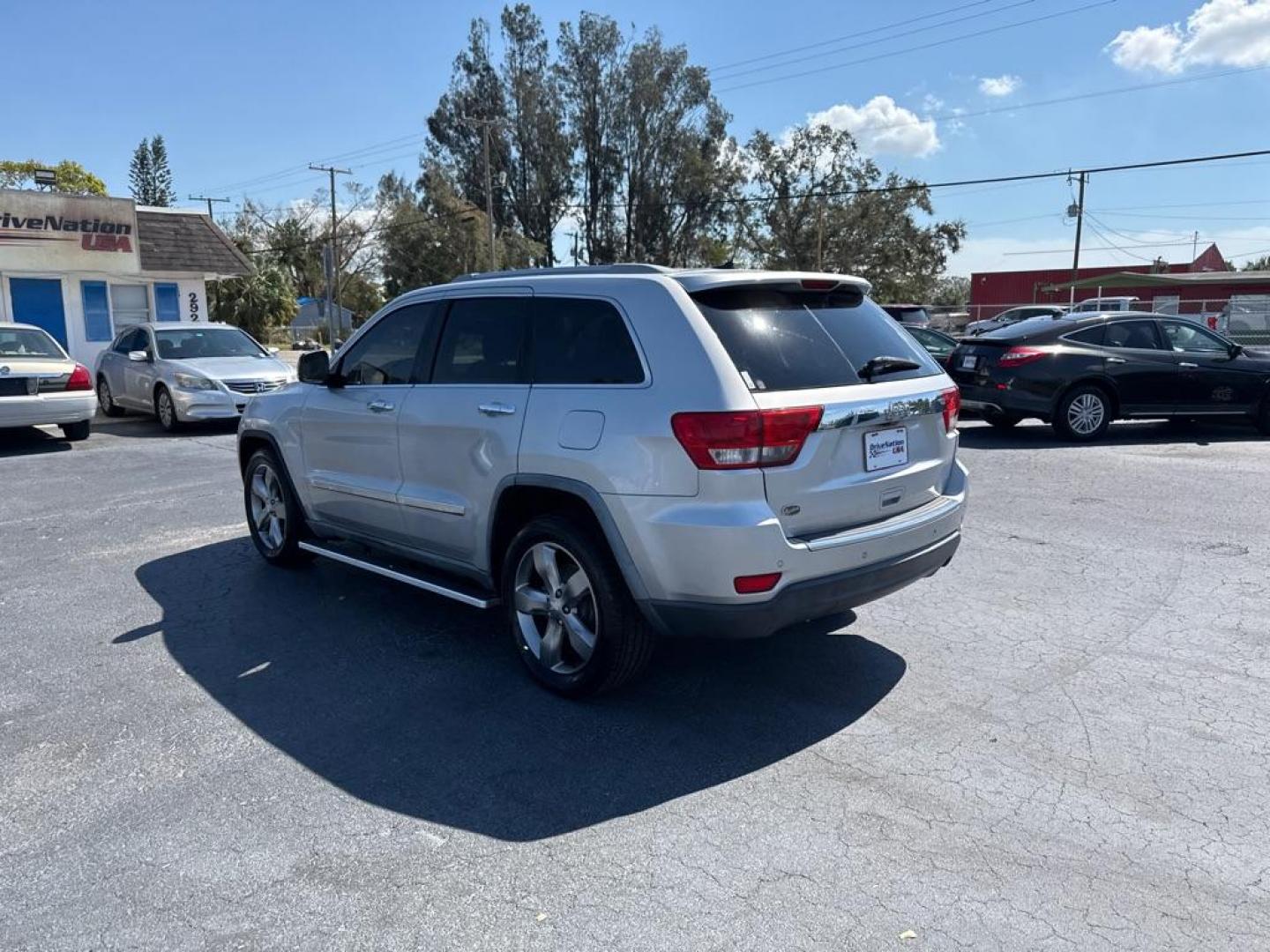 2011 SILVER JEEP GRAND CHEROKEE OVERLAND (1J4RS6GG1BC) with an 3.6L engine, Automatic transmission, located at 2929 9th St. West, Bradenton, 34205, (941) 242-2810, 27.473591, -82.570679 - Photo#5