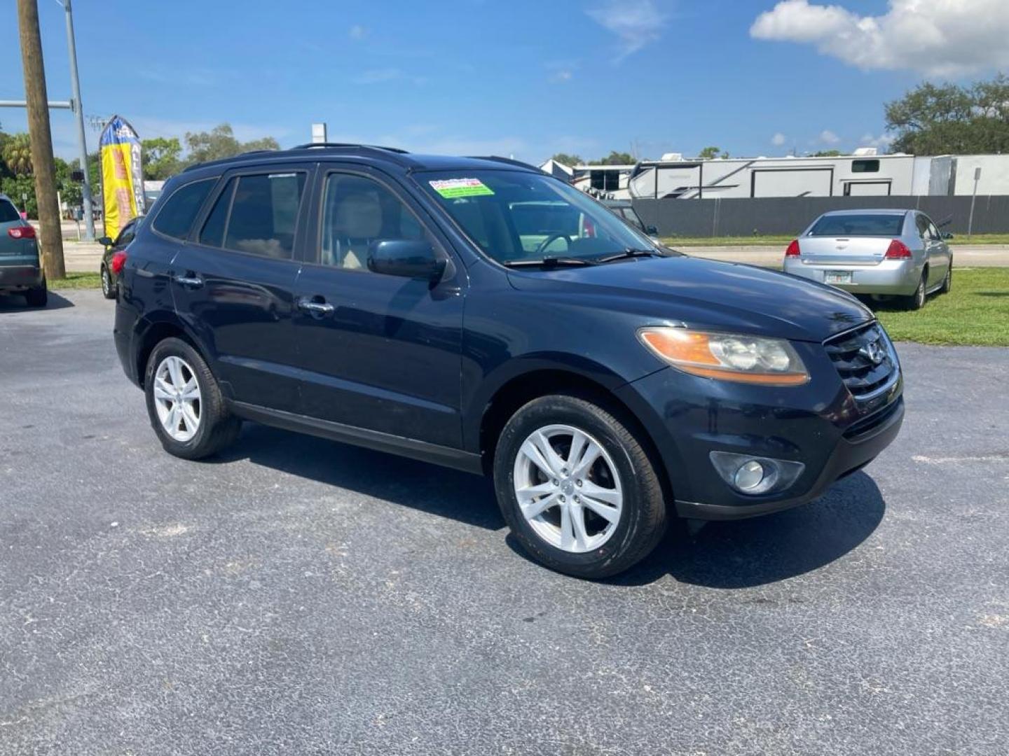 2010 BLACK HYUNDAI SANTA FE LIMITED (5NMSK3AB5AH) with an 2.4L engine, Automatic transmission, located at 2929 9th St. West, Bradenton, 34205, (941) 242-2810, 27.473591, -82.570679 - Photo#0