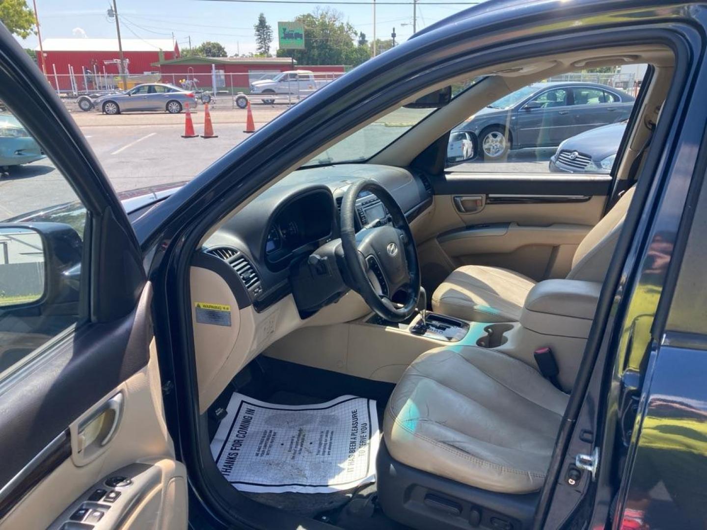 2010 BLACK HYUNDAI SANTA FE LIMITED (5NMSK3AB5AH) with an 2.4L engine, Automatic transmission, located at 2929 9th St. West, Bradenton, 34205, (941) 242-2810, 27.473591, -82.570679 - Photo#10