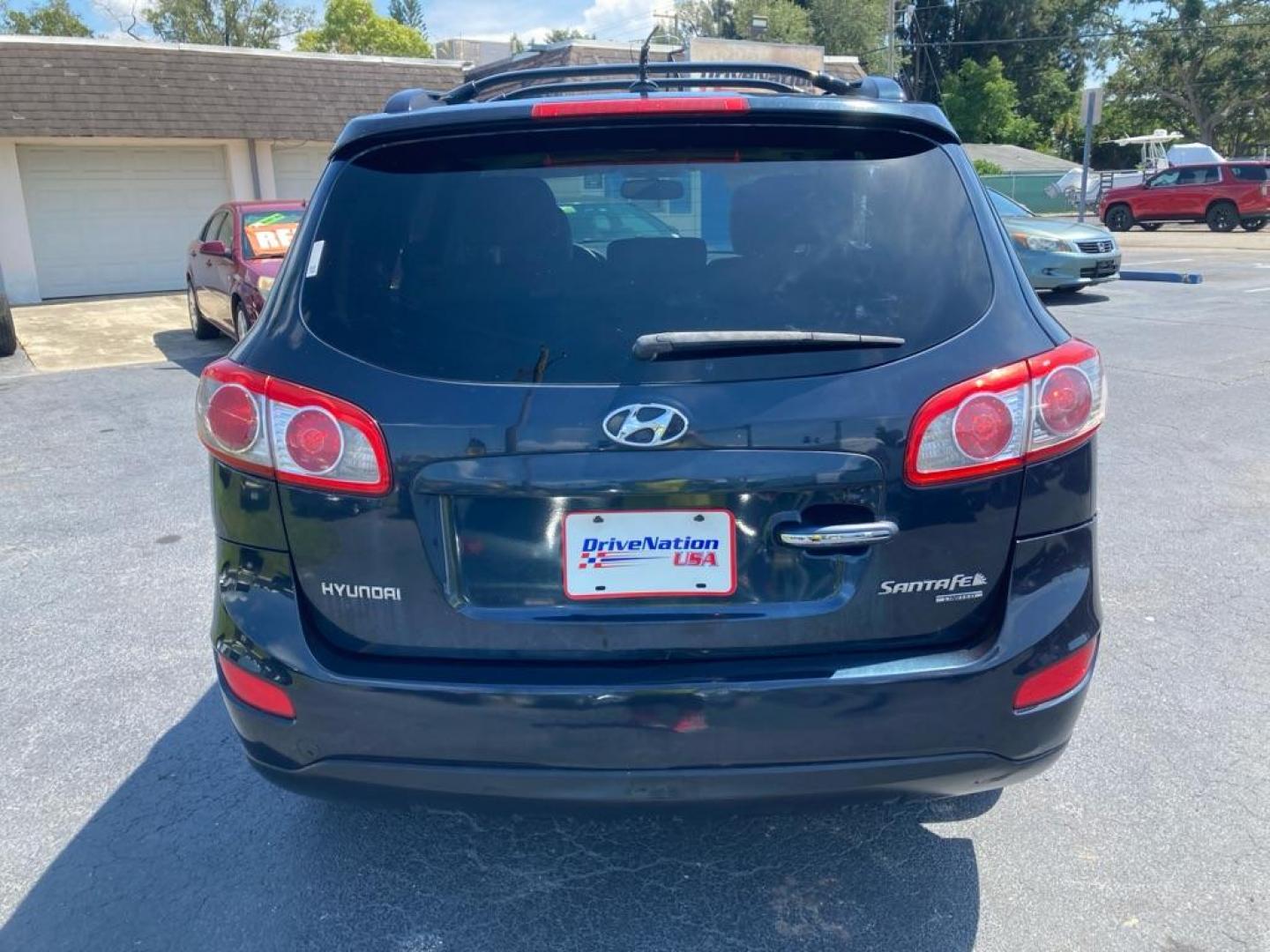 2010 BLACK HYUNDAI SANTA FE LIMITED (5NMSK3AB5AH) with an 2.4L engine, Automatic transmission, located at 2929 9th St. West, Bradenton, 34205, (941) 242-2810, 27.473591, -82.570679 - Photo#4