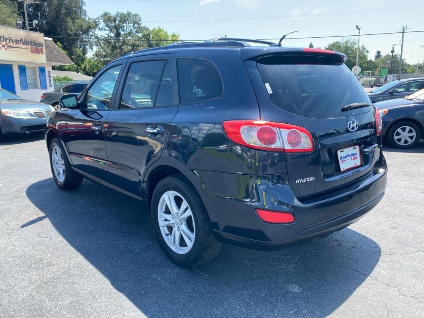 2010 BLACK HYUNDAI SANTA FE LIMITED (5NMSK3AB5AH) with an 2.4L engine, Automatic transmission, located at 2929 9th St. West, Bradenton, 34205, (941) 242-2810, 27.473591, -82.570679 - Photo#5