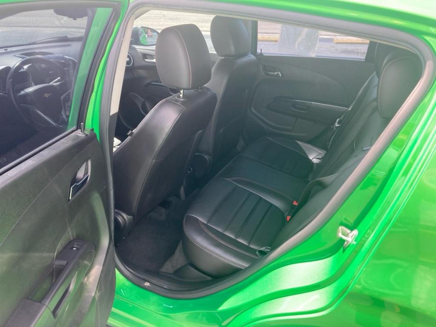 2014 GREEN CHEVROLET SONIC RS (1G1JG6SB2E4) with an 1.4L engine, Automatic transmission, located at 2929 9th St. West, Bradenton, 34205, (941) 242-2810, 27.473591, -82.570679 - Thanks for inquring into DriveNation USA! All vehicles listed can be viewed at www.drivenationusa.com for vehicle history reports and additonal info. We cannot quote any terms such as down payments or monthly payments without an application. You can apply directly at www.drivenationusa.com or by con - Photo#12