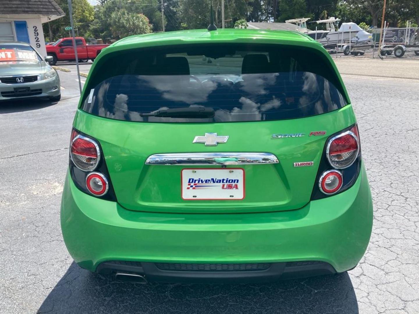 2014 GREEN CHEVROLET SONIC RS (1G1JG6SB2E4) with an 1.4L engine, Automatic transmission, located at 2929 9th St. West, Bradenton, 34205, (941) 242-2810, 27.473591, -82.570679 - Thanks for inquring into DriveNation USA! All vehicles listed can be viewed at www.drivenationusa.com for vehicle history reports and additonal info. We cannot quote any terms such as down payments or monthly payments without an application. You can apply directly at www.drivenationusa.com or by con - Photo#5