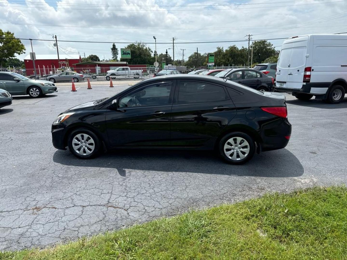 2016 BLACK HYUNDAI ACCENT SE (KMHCT4AE9GU) with an 1.6L engine, Automatic transmission, located at 2929 9th St. West, Bradenton, 34205, (941) 242-2810, 27.473591, -82.570679 - Thanks for inquring into DriveNation USA! All vehicles listed can be viewed at www.drivenationusa.com for vehicle history reports and additonal info. We cannot quote any terms such as down payments or monthly payments without an application. You can apply directly at www.drivenationusa.com or by con - Photo#5