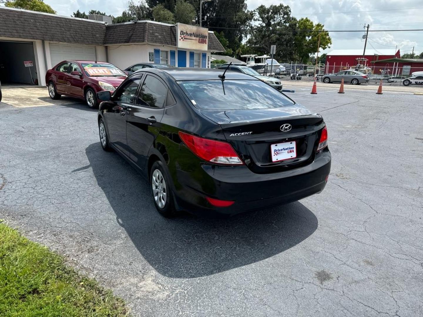 2016 BLACK HYUNDAI ACCENT SE (KMHCT4AE9GU) with an 1.6L engine, Automatic transmission, located at 2929 9th St. West, Bradenton, 34205, (941) 242-2810, 27.473591, -82.570679 - Thanks for inquring into DriveNation USA! All vehicles listed can be viewed at www.drivenationusa.com for vehicle history reports and additonal info. We cannot quote any terms such as down payments or monthly payments without an application. You can apply directly at www.drivenationusa.com or by con - Photo#6