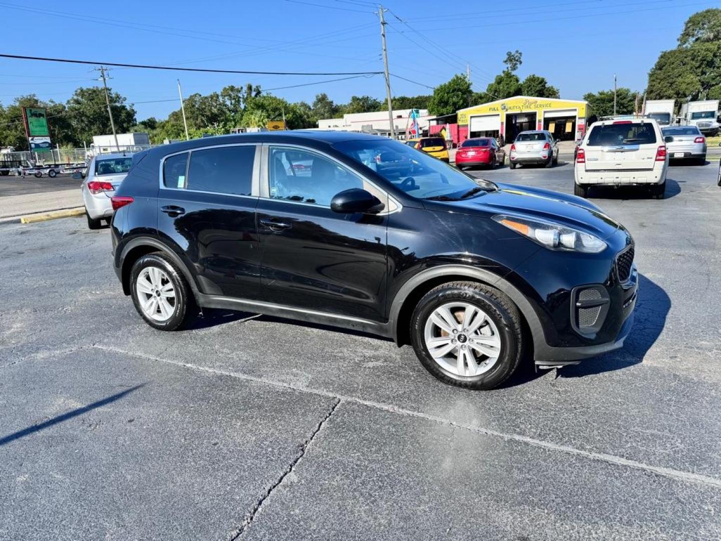 2017 BLACK KIA SPORTAGE LX (KNDPM3AC6H7) with an 2.4L engine, Automatic transmission, located at 2929 9th St. West, Bradenton, 34205, (941) 242-2810, 27.473591, -82.570679 - Photo#0